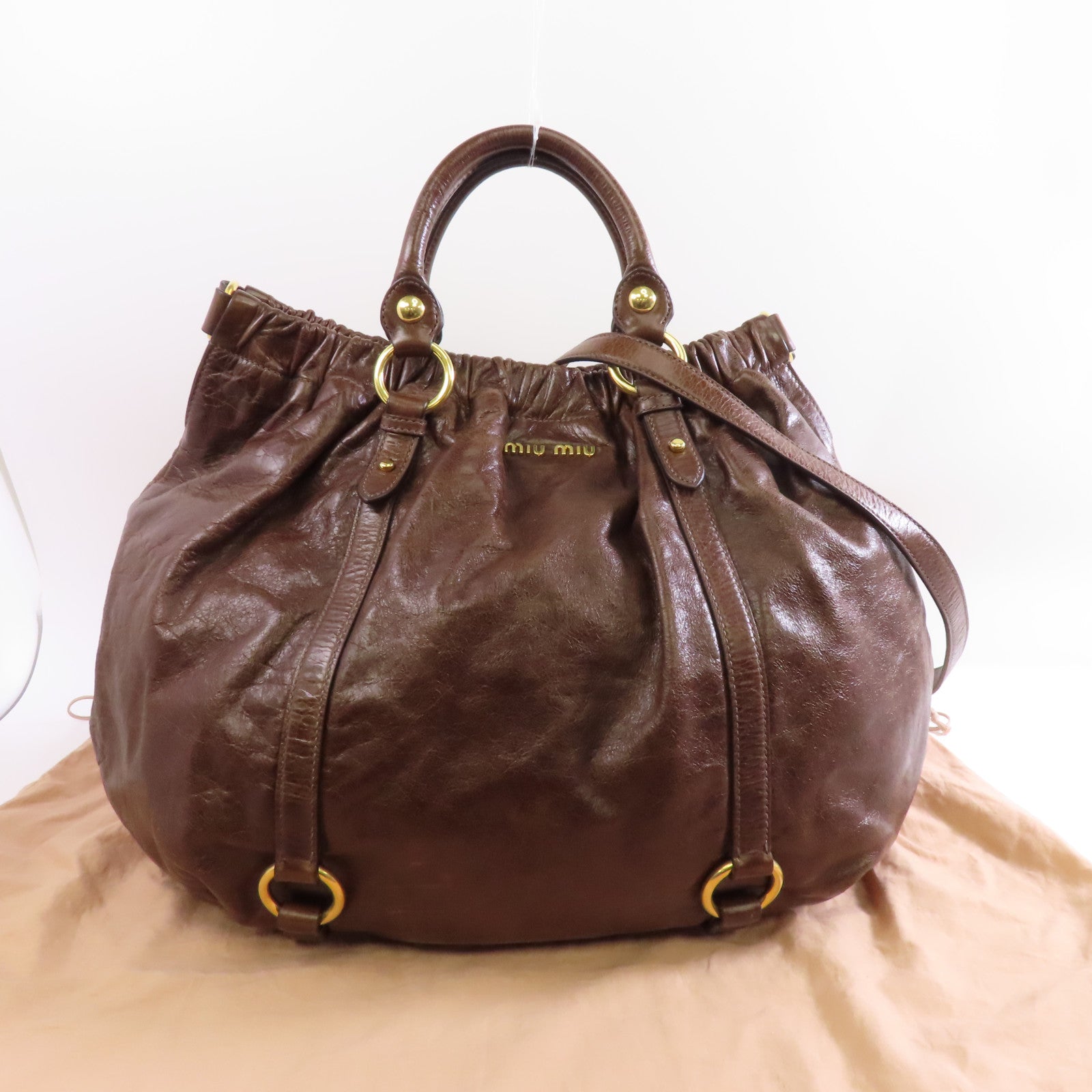 Miu Miu 牛皮皮革Vitello Lux金扣手挽肩背兩用袋啡色