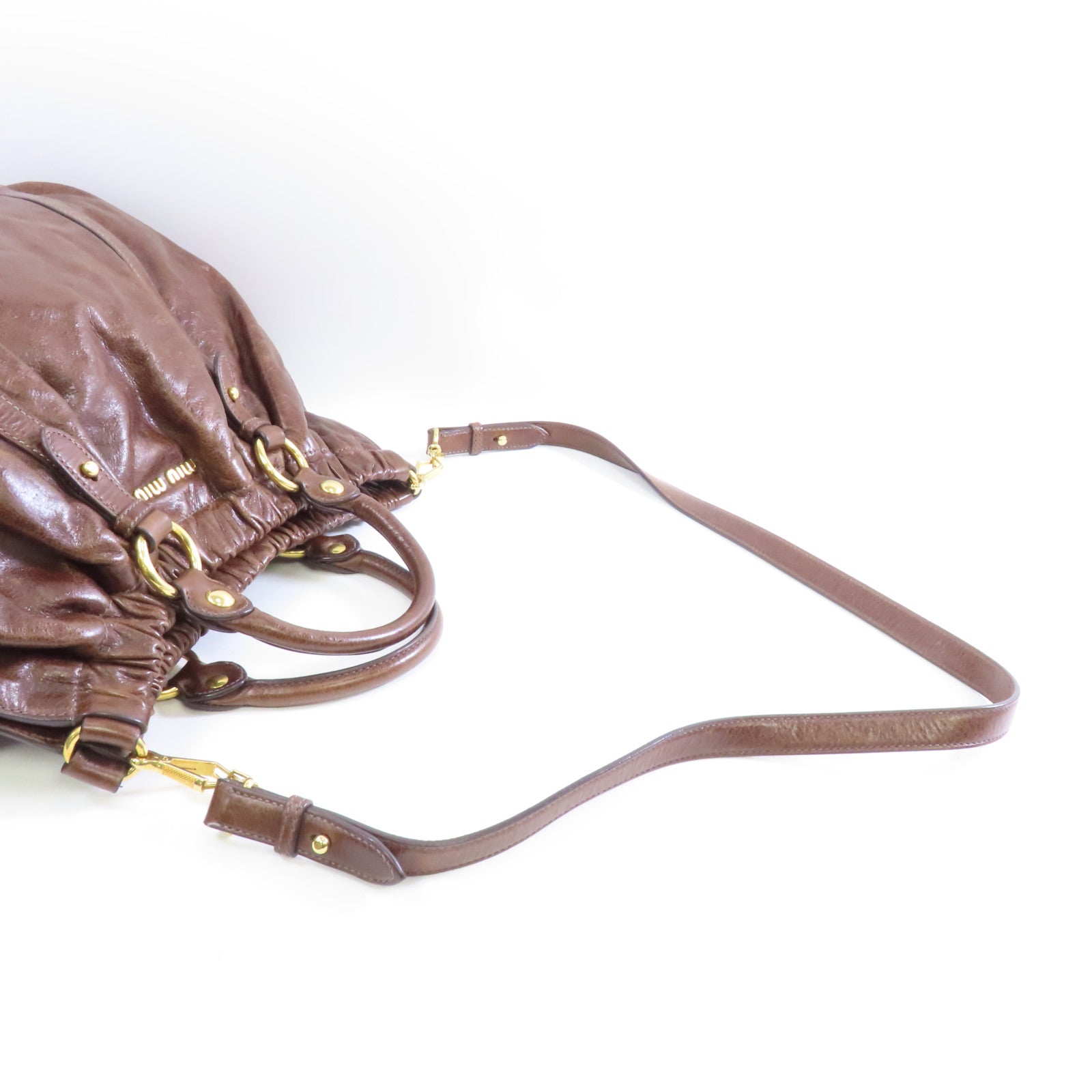 Miu Miu 牛皮皮革Vitello Lux金扣手挽肩背兩用袋啡色