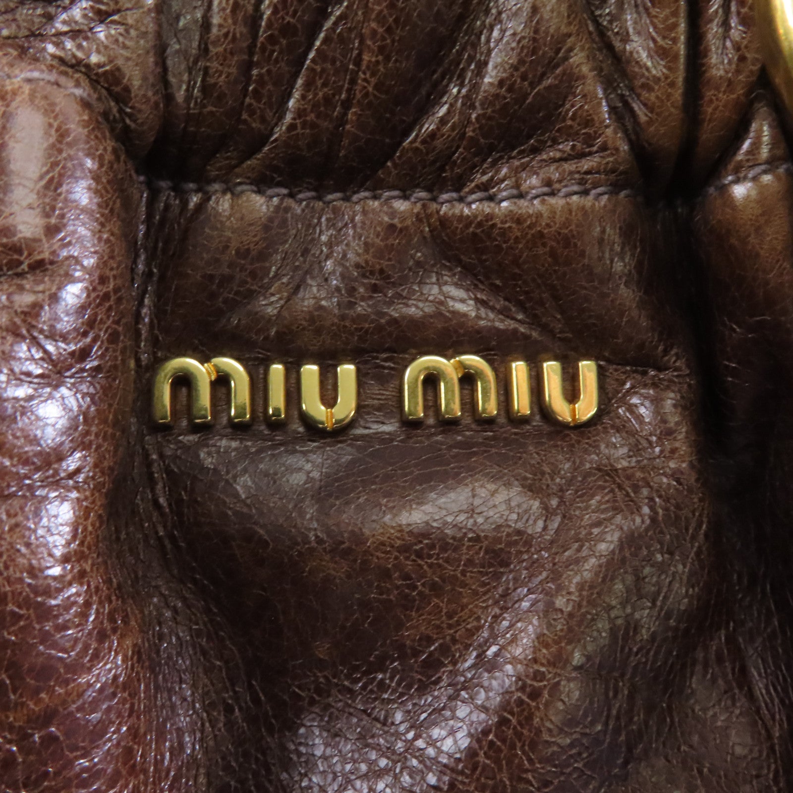 Miu Miu 牛皮皮革Vitello Lux金扣手挽肩背兩用袋啡色