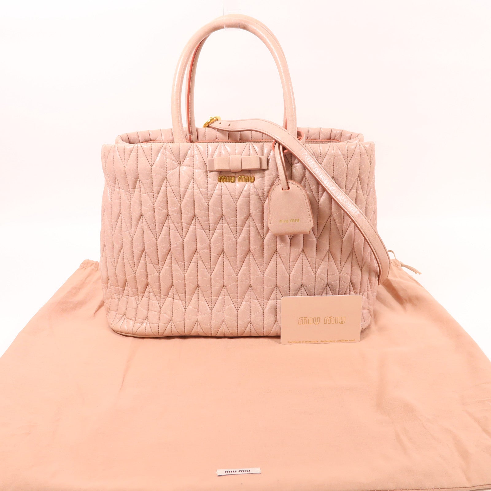 Miu Miu 牛皮皮革Matelasse金扣手挽肩背兩用袋