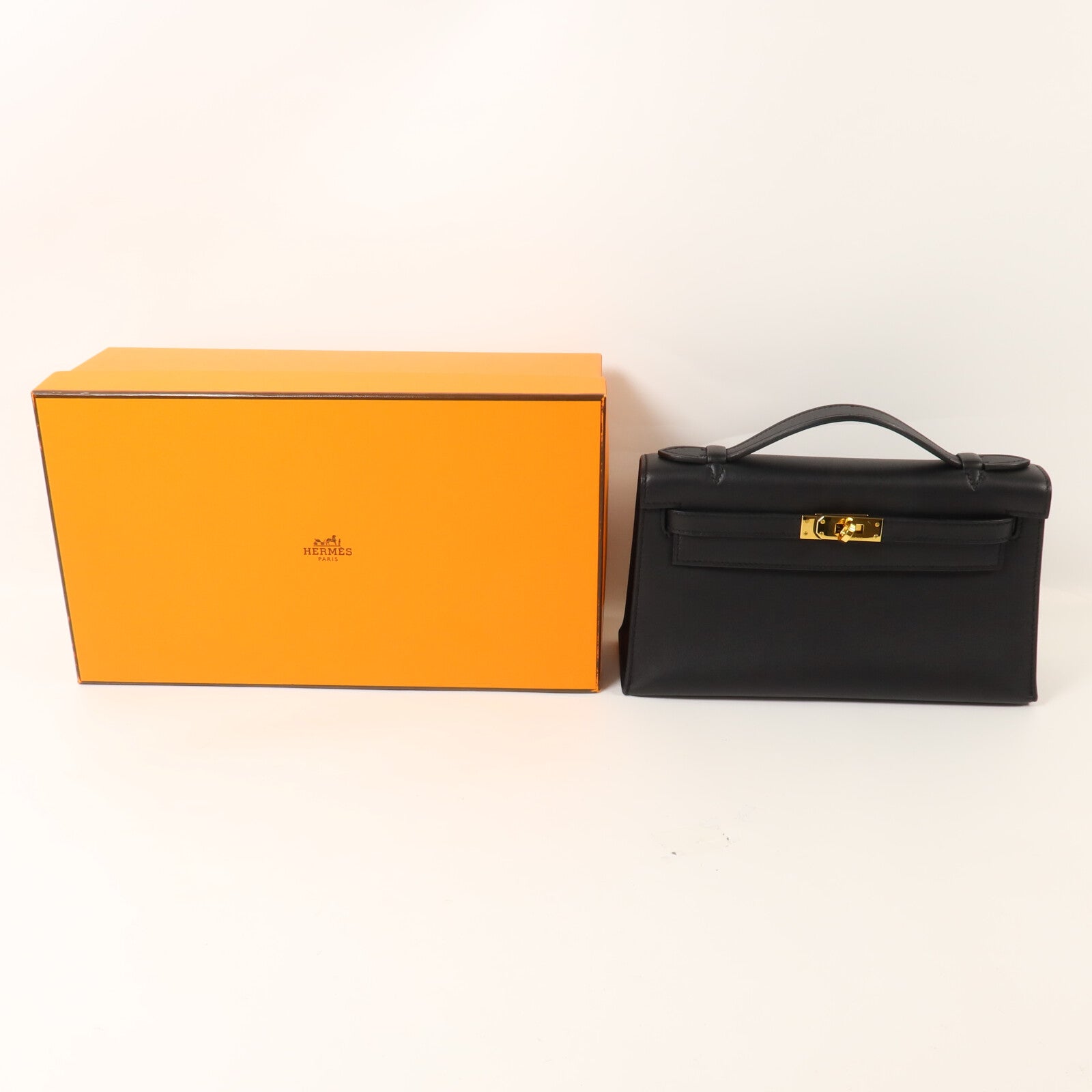 HERMES Swift皮革Kelly Pochette手挽袋Noir