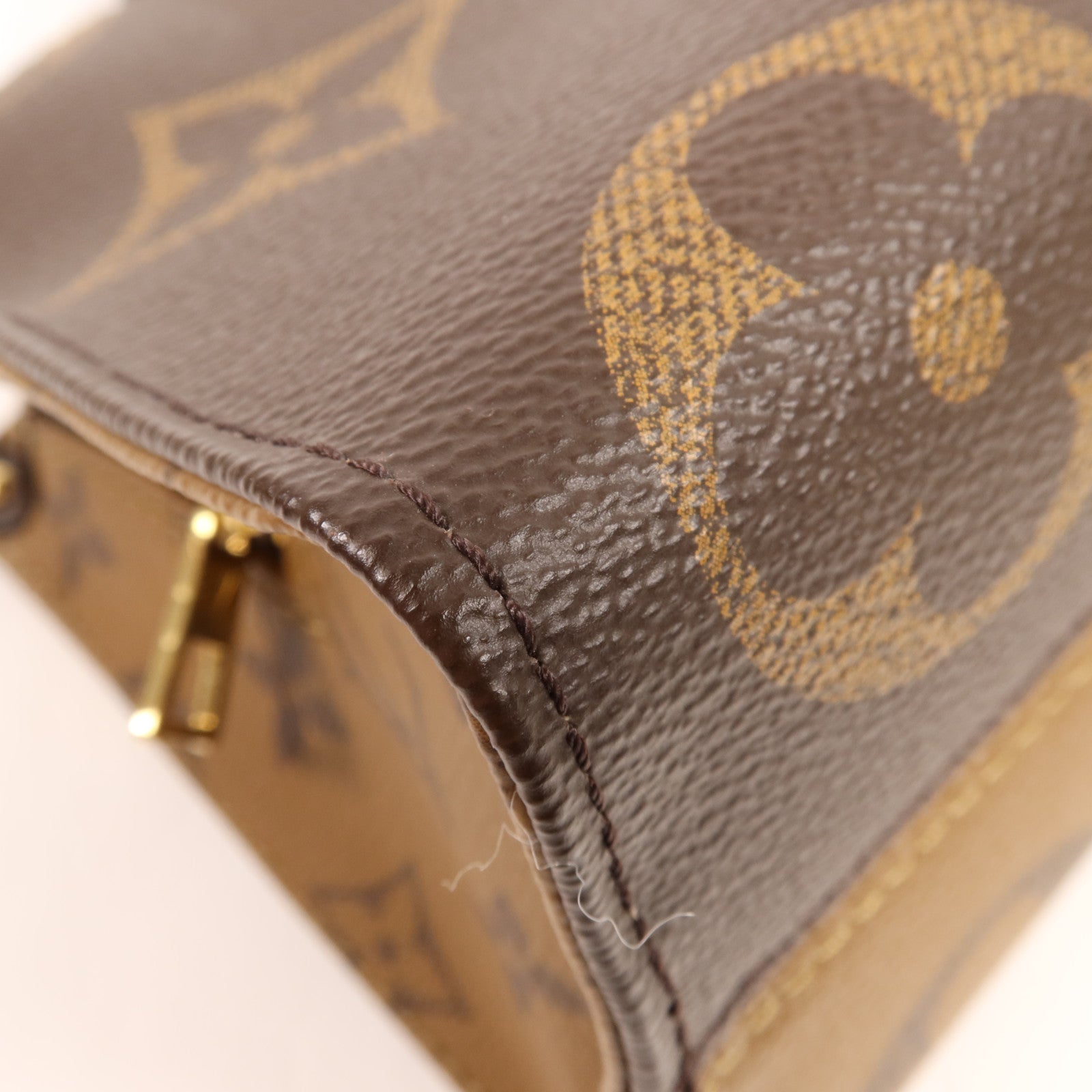 LOUIS VUITTON Monogram Giant Reverse On The Go East West金扣手挽肩背兩用袋