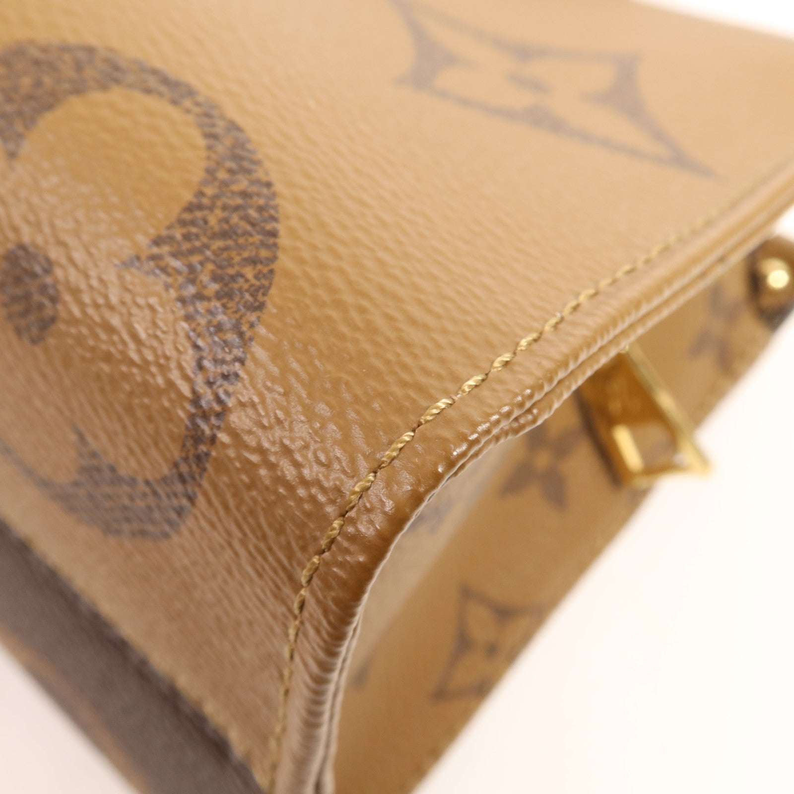 LOUIS VUITTON Monogram Giant Reverse On The Go East West金扣手挽肩背兩用袋
