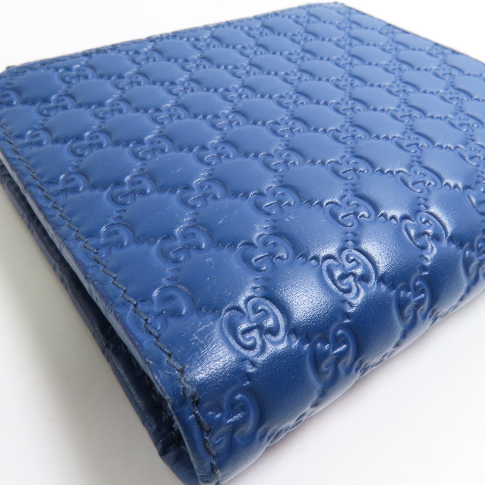 GUCCI 牛皮皮革Embossed Zipped Wallet金扣錢包