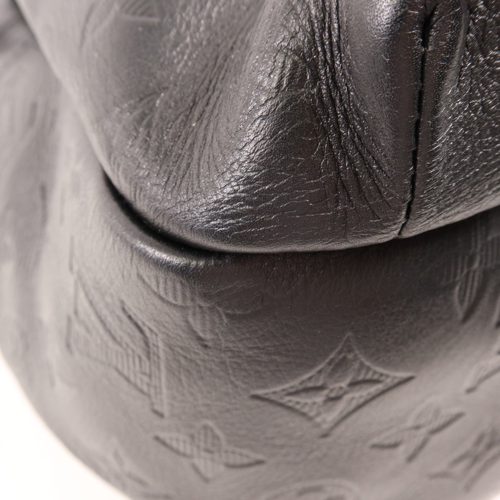 LOUIS VUITTON Monogram Embossed Discovery Backpack銀扣背包