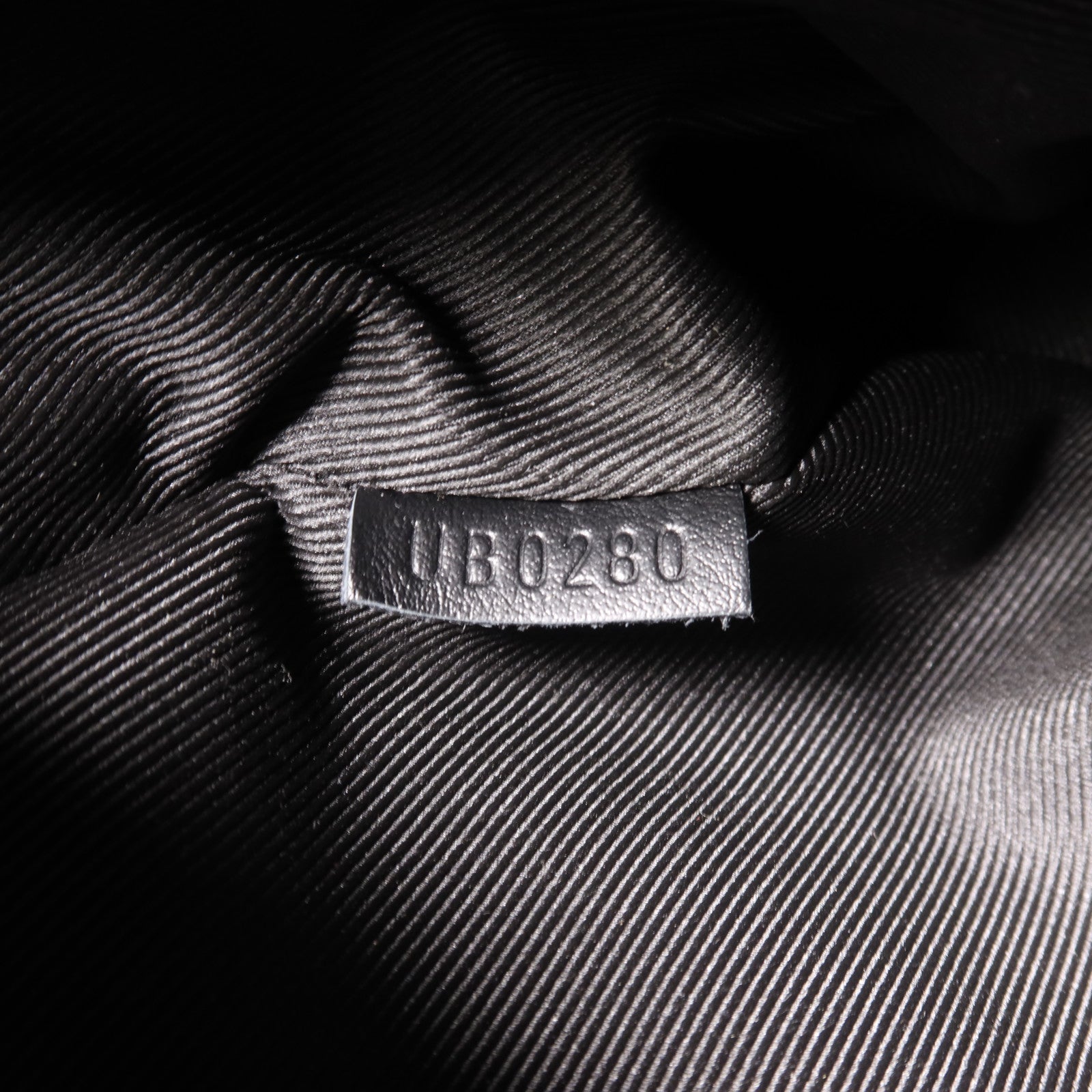 LOUIS VUITTON Monogram Embossed Discovery Backpack銀扣背包