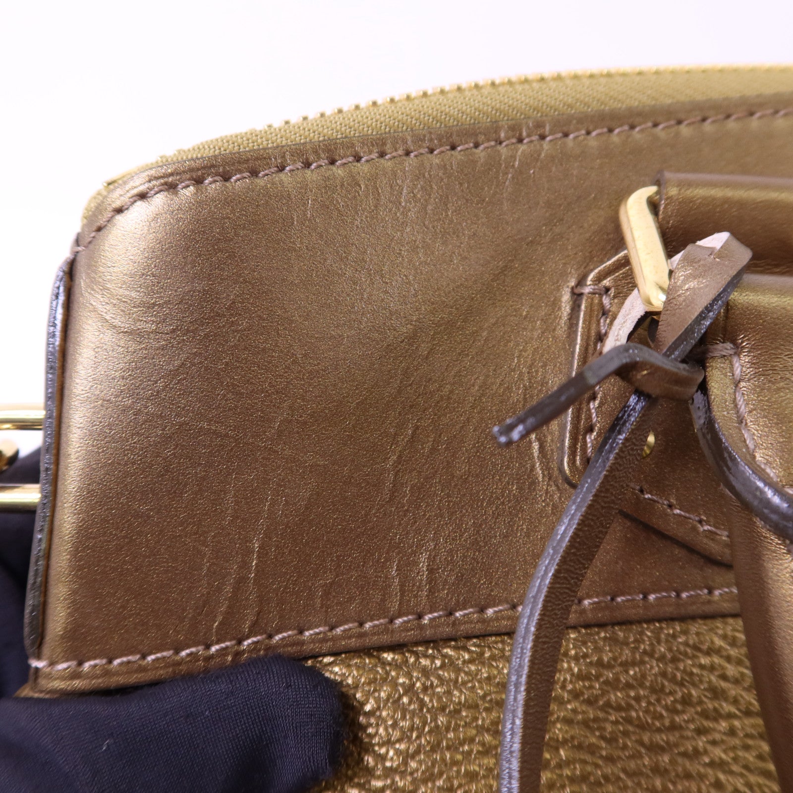 LOUIS VUITTON Suhali Lockit PM金扣手挽袋