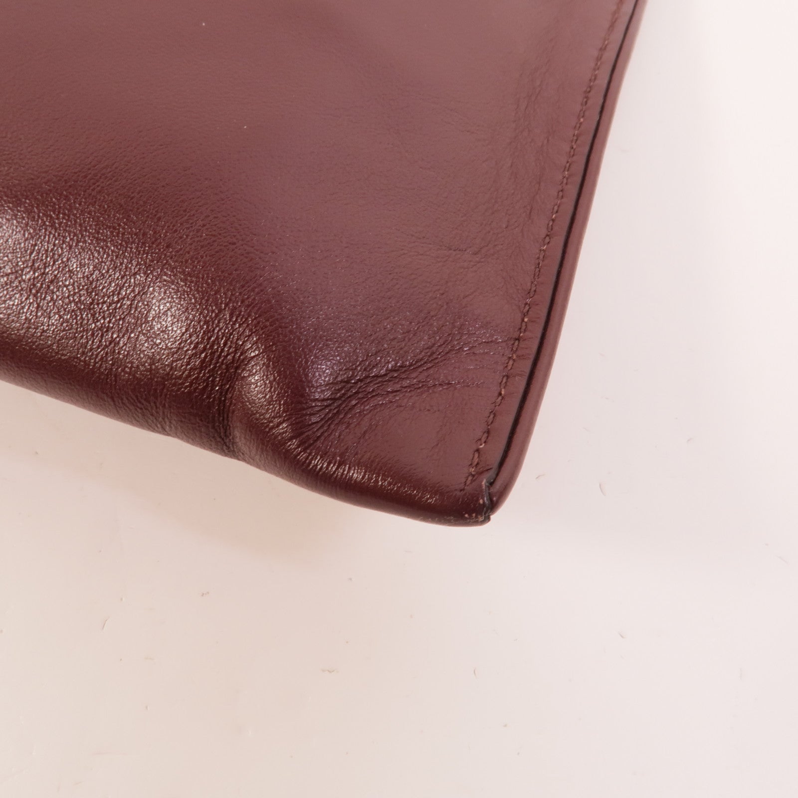 Miu Miu 羊皮皮革Studded Zip Clutch手拿包