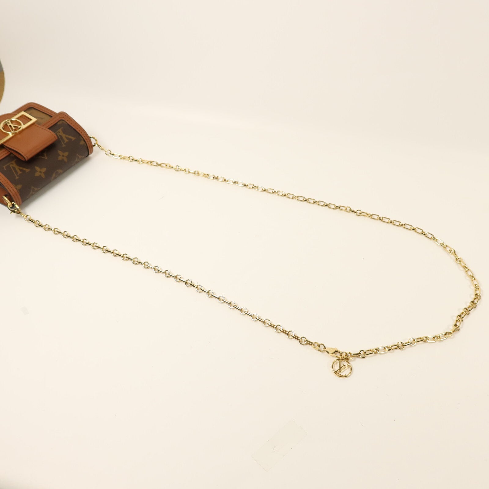 LOUIS VUITTON Monogram/Monogram Reverse Micro Dauphine金扣鏈帶肩背袋棕色