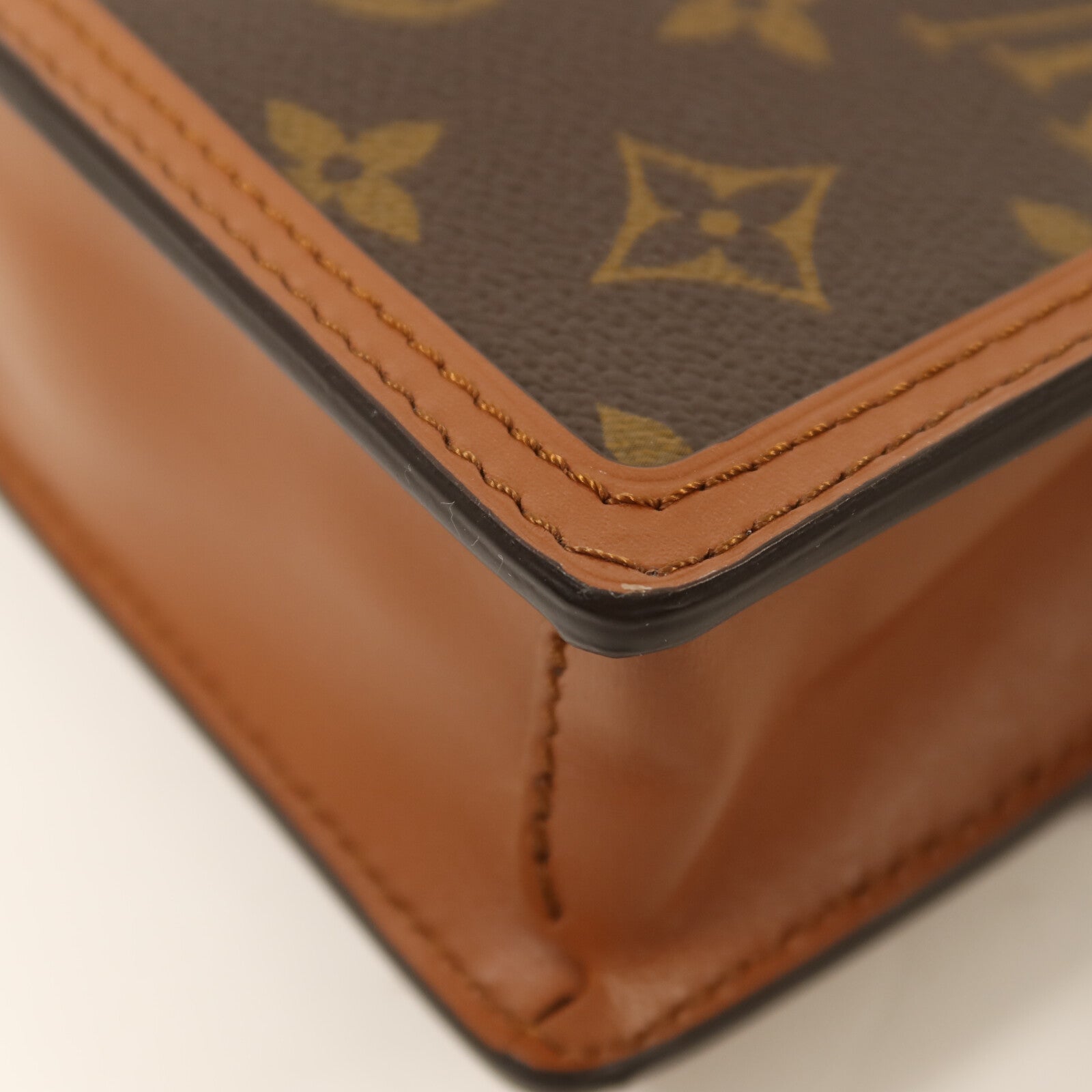 LOUIS VUITTON Monogram/Monogram Reverse Micro Dauphine金扣鏈帶肩背袋棕色