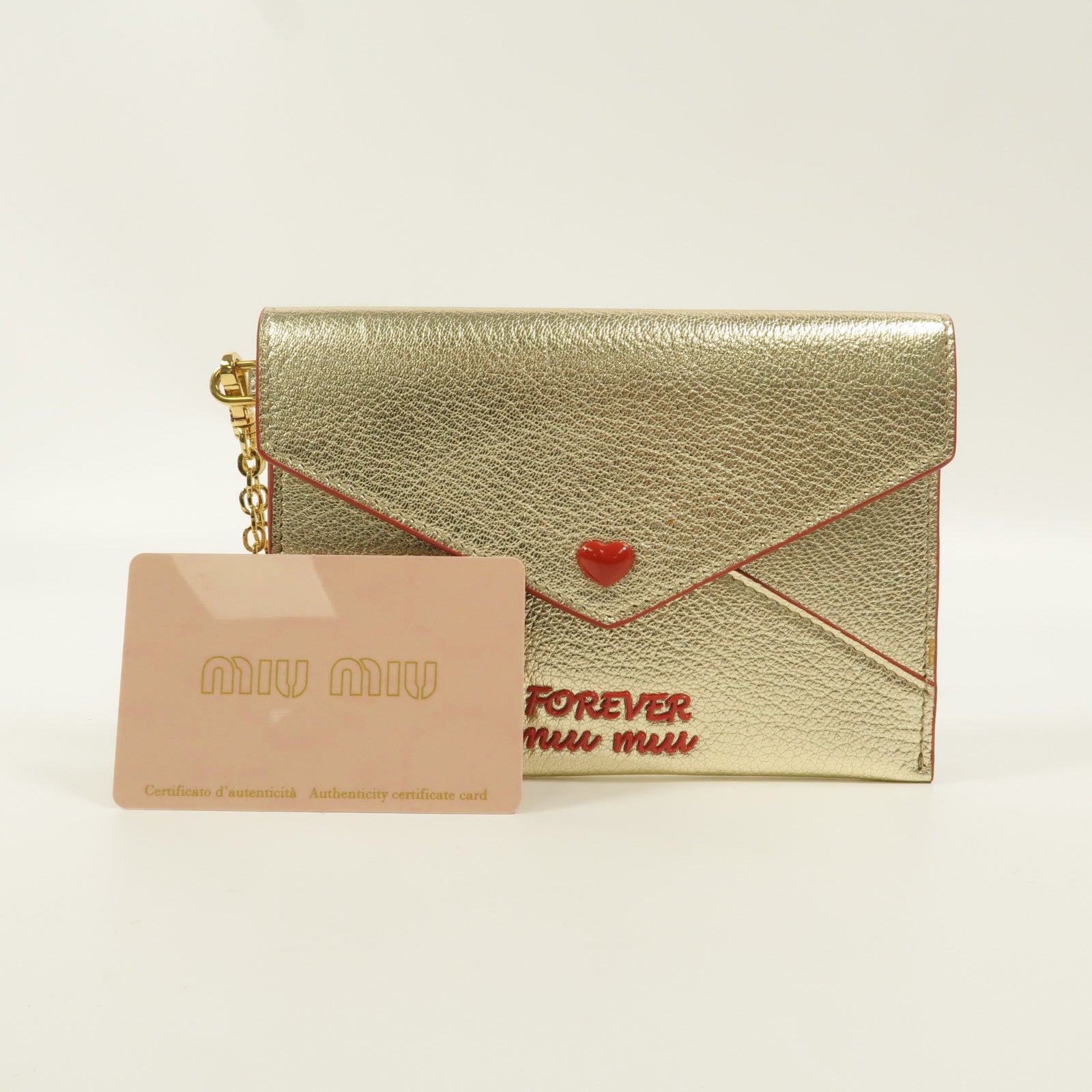 Miu Miu 牛皮皮革Madras Love手拿包