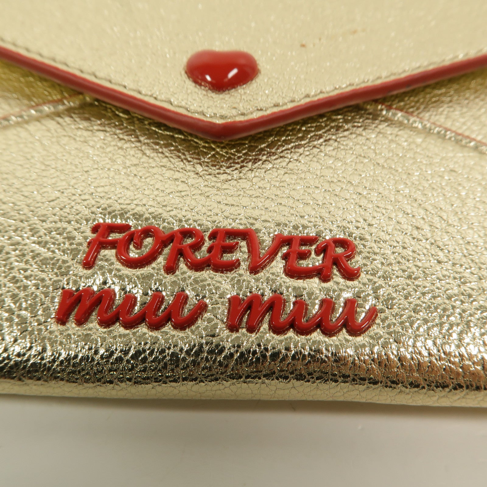Miu Miu 牛皮皮革Madras Love手拿包