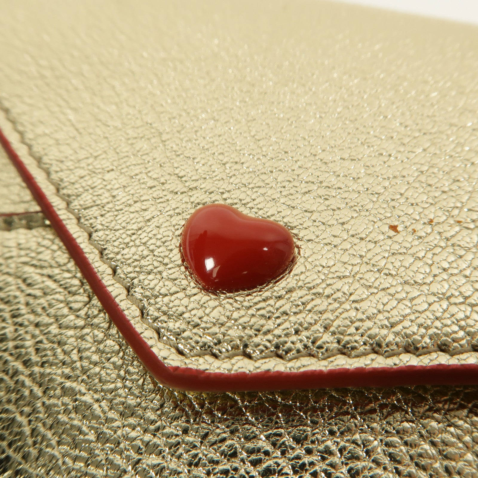 Miu Miu 牛皮皮革Madras Love手拿包