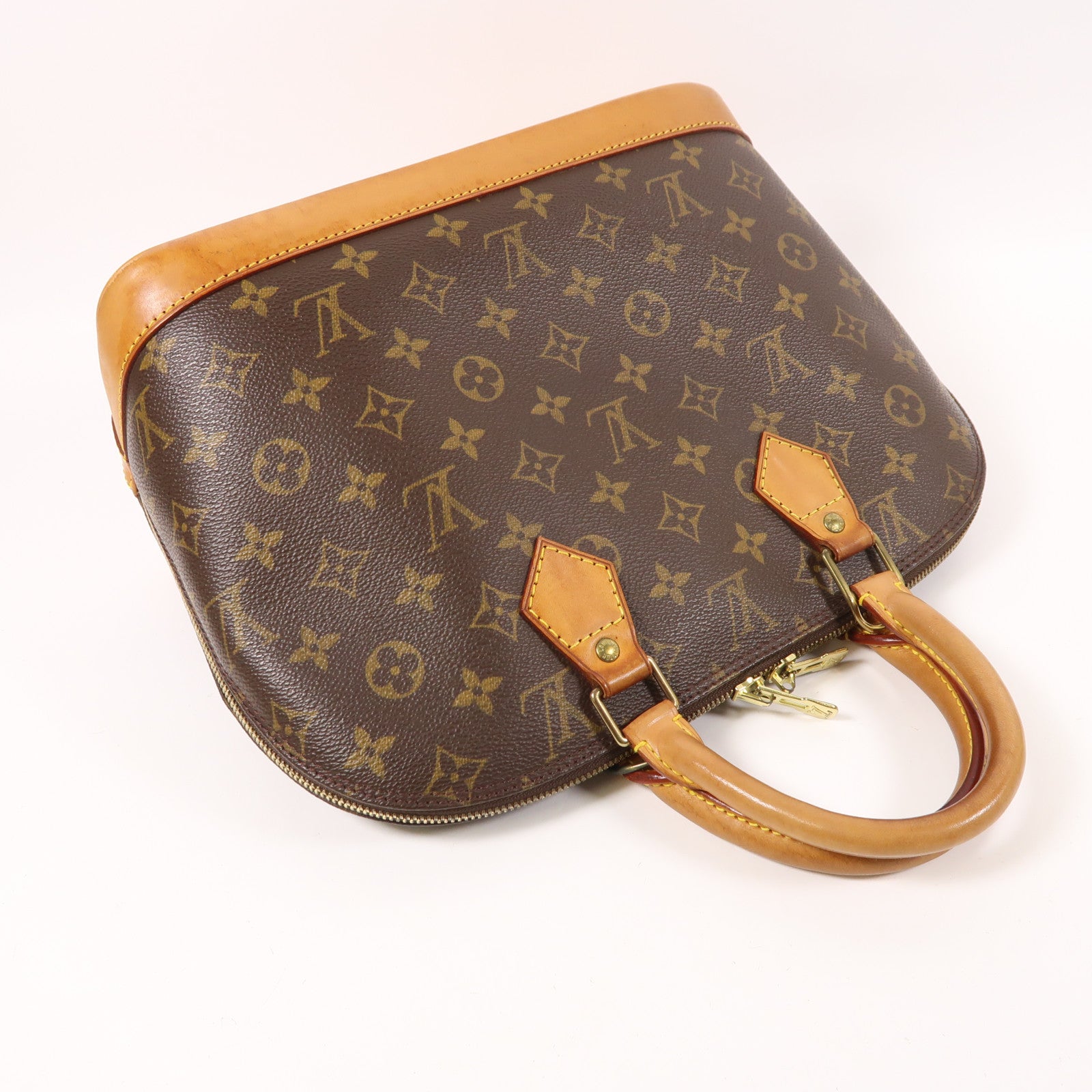 LOUIS VUITTON Monogram Alma金扣手挽袋棕色