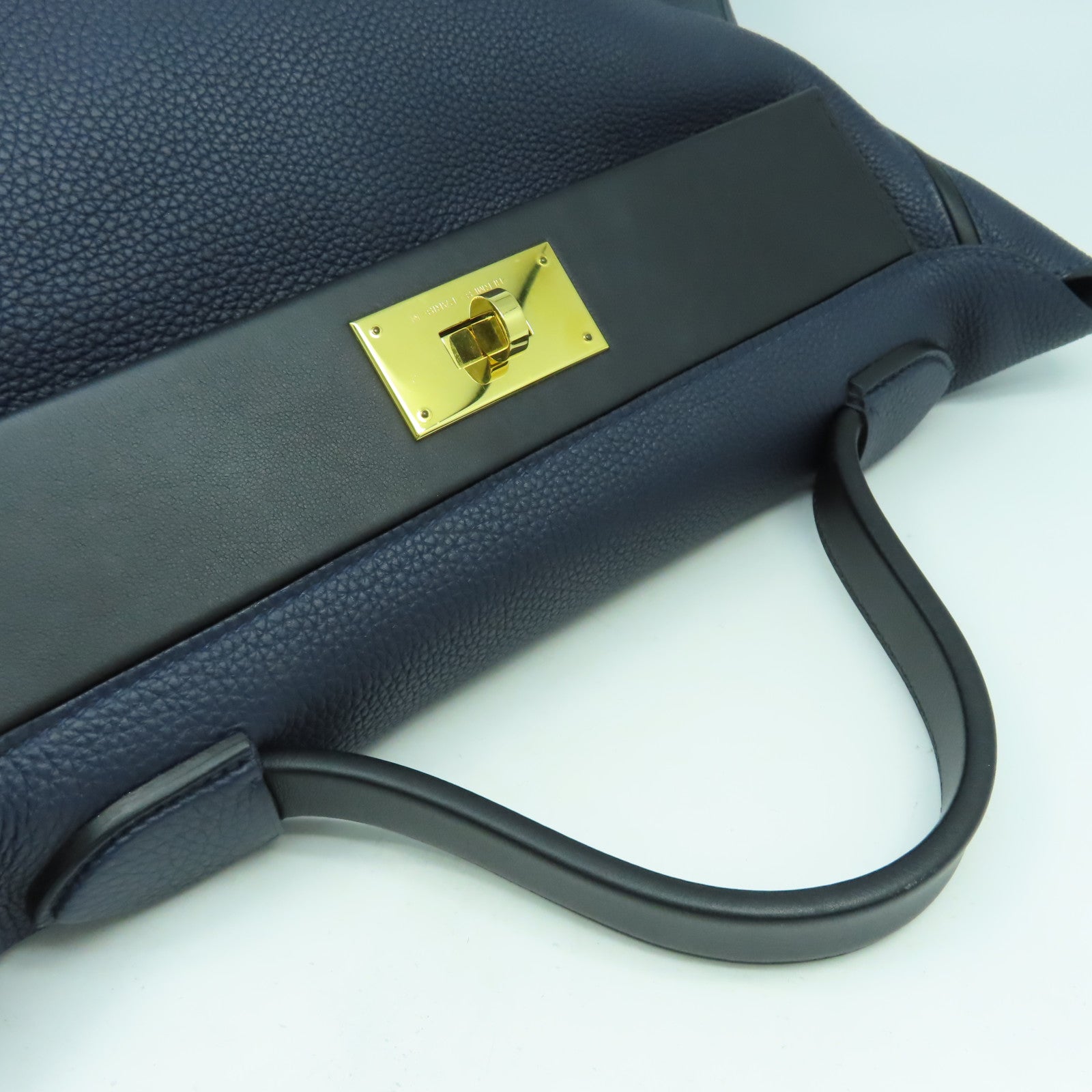 HERMES 【激減優惠】Clemence皮革24/24 35cm金扣手挽袋午夜藍色/黑色