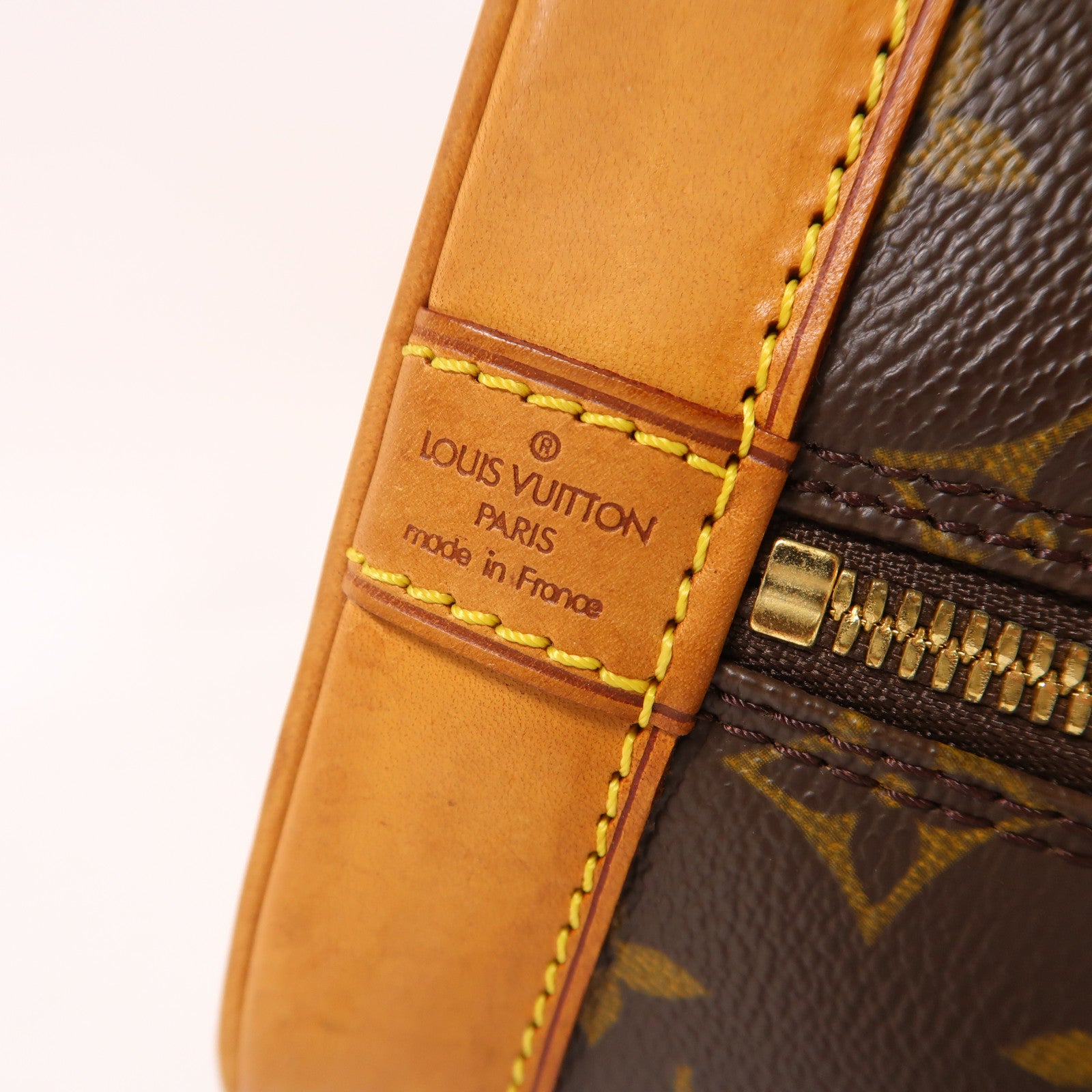 LOUIS VUITTON Monogram Alma金扣手挽袋棕色