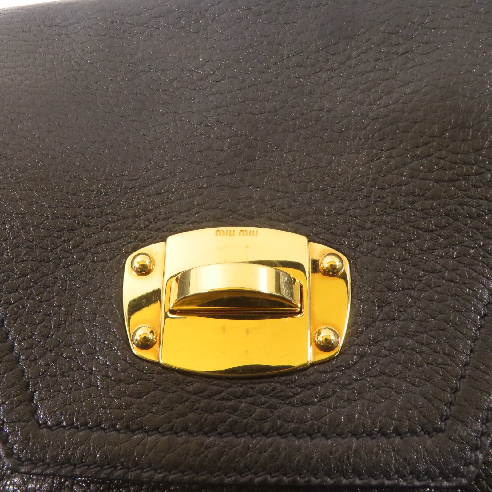 Miu Miu 牛皮皮革East West金扣手挽肩背兩用袋黑色