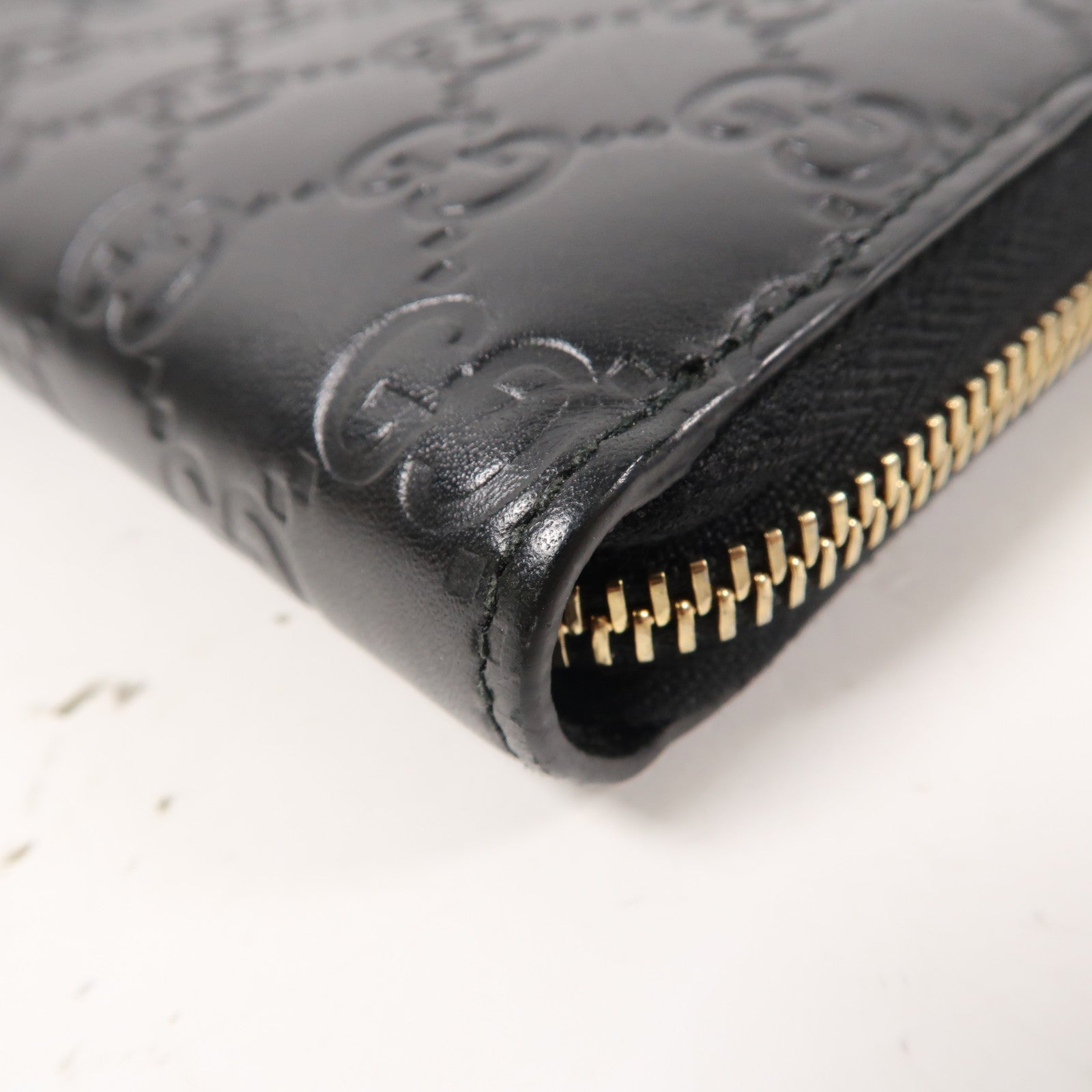 GUCCI 牛皮皮革Guccissima Round Long WalletL形拉鍊長錢包黑色