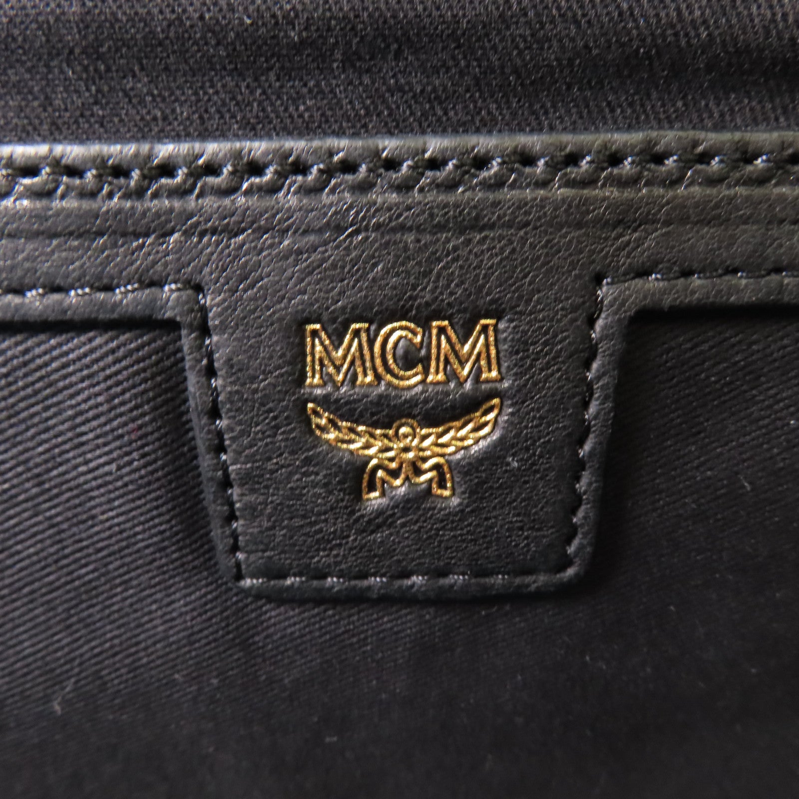 MCM 皮革Stark Insignia Backpack銀扣背包