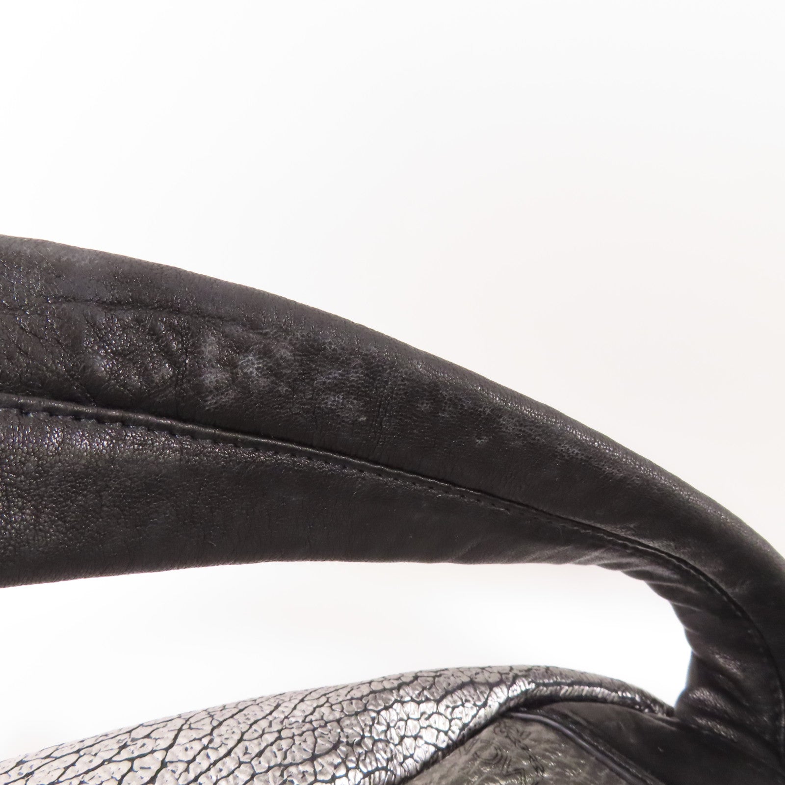 MCM 皮革Stark Insignia Backpack銀扣背包