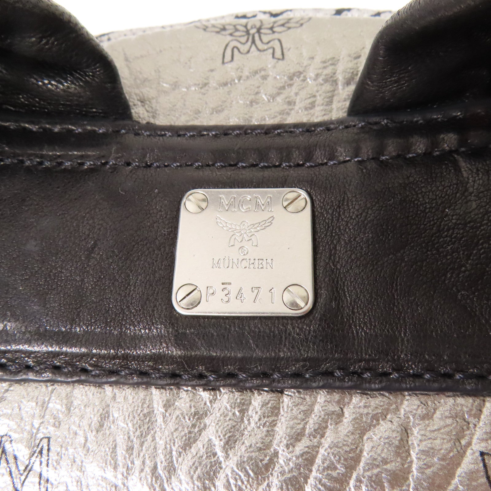 MCM 皮革Stark Insignia Backpack銀扣背包