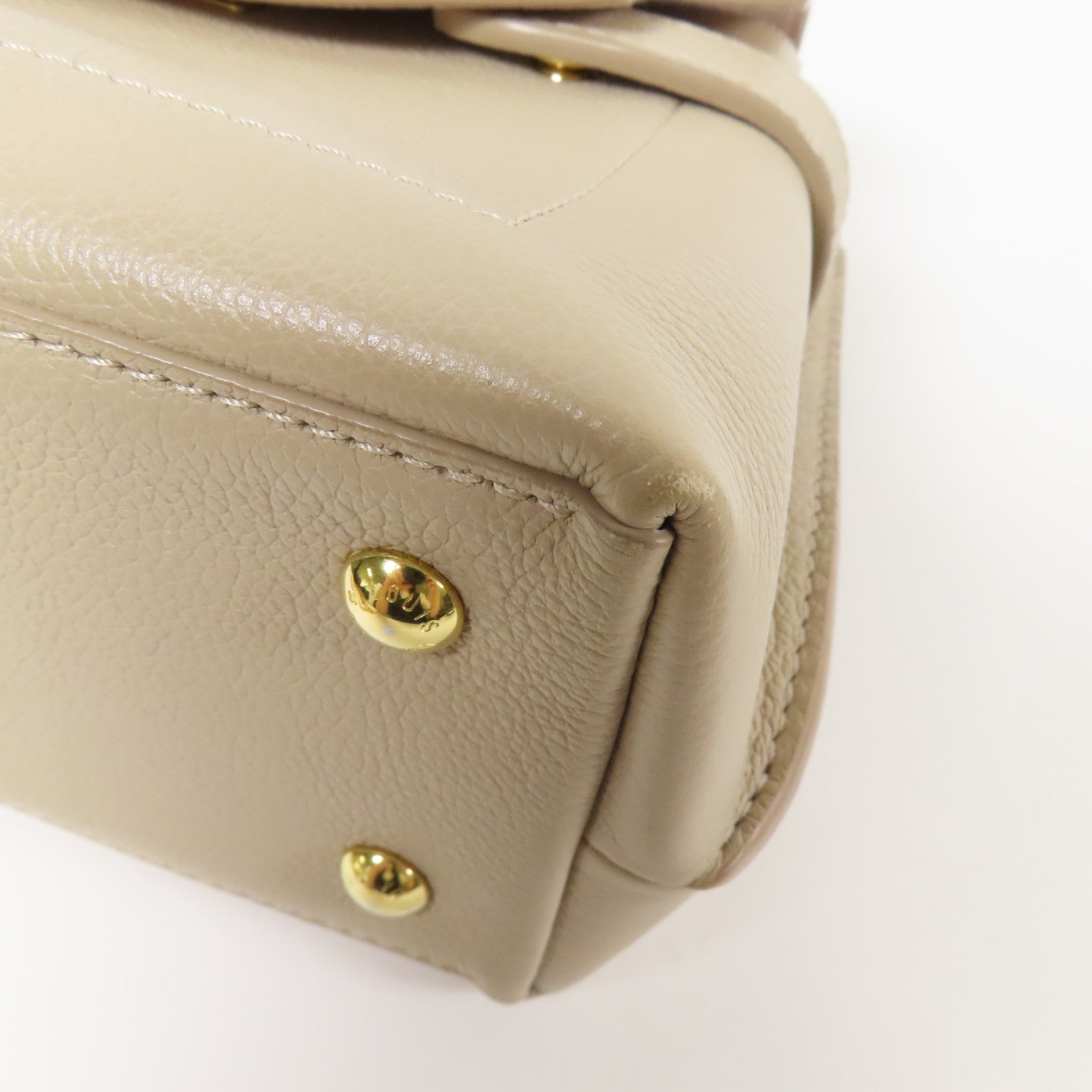 LOUIS VUITTON 牛皮皮革Lockme Ever Mini金扣手挽肩背兩用袋