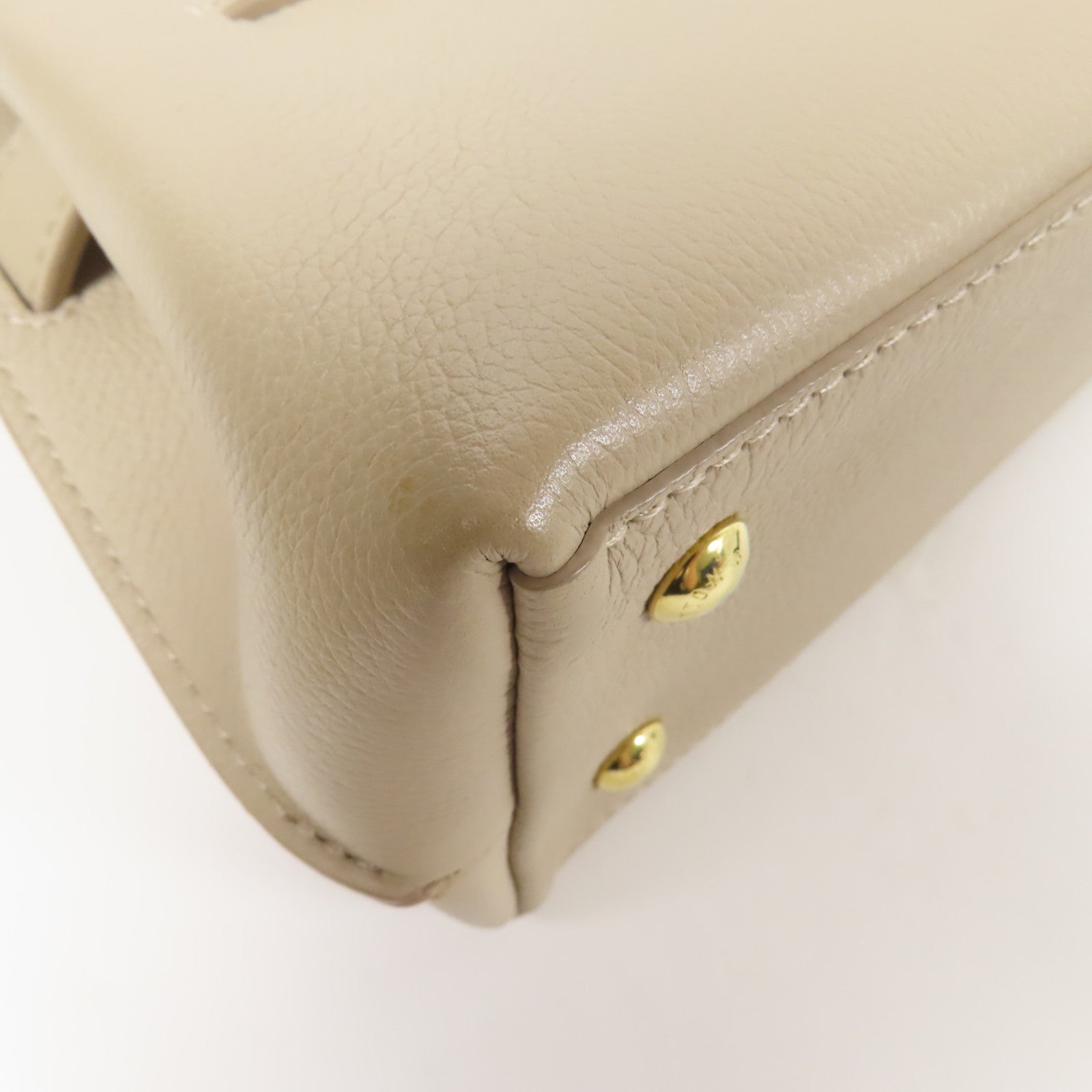 LOUIS VUITTON 牛皮皮革Lockme Ever Mini金扣手挽肩背兩用袋