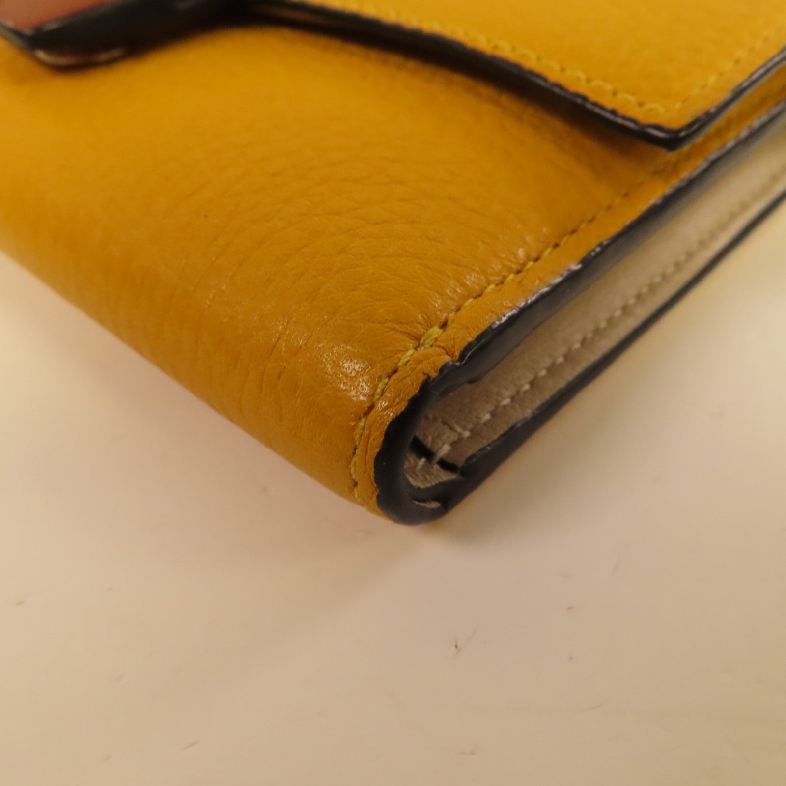LOEWE 【激減優惠】牛皮皮革Wallet銀扣鈕扣錢包黃色