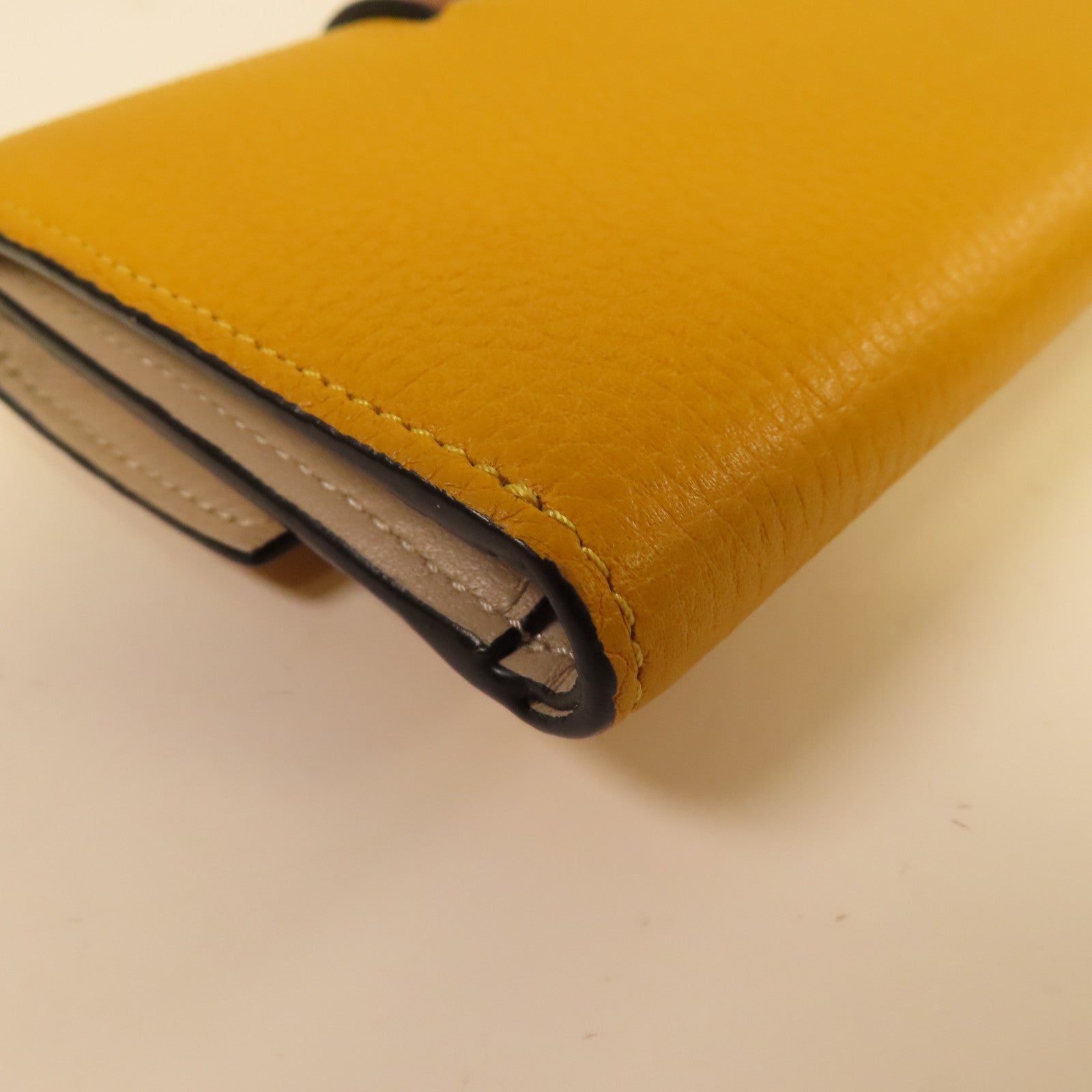 LOEWE 【激減優惠】牛皮皮革Wallet銀扣鈕扣錢包黃色