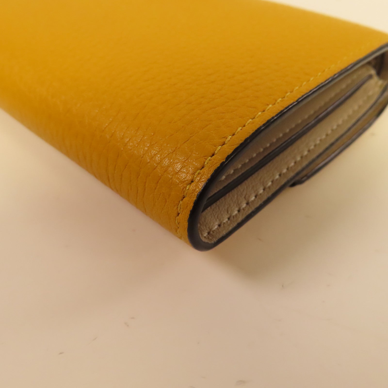 LOEWE 【激減優惠】牛皮皮革Wallet銀扣鈕扣錢包黃色