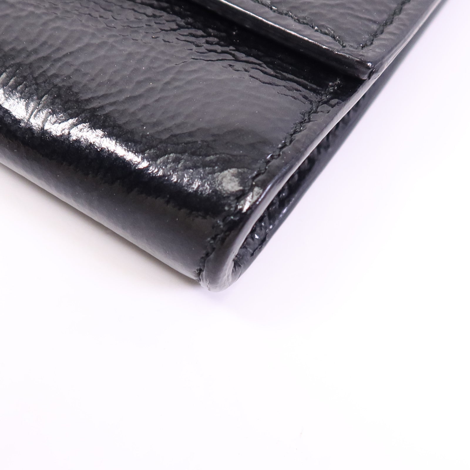 YVES SAINT LAURENT 牛皮皮革Clutch金扣手拿包