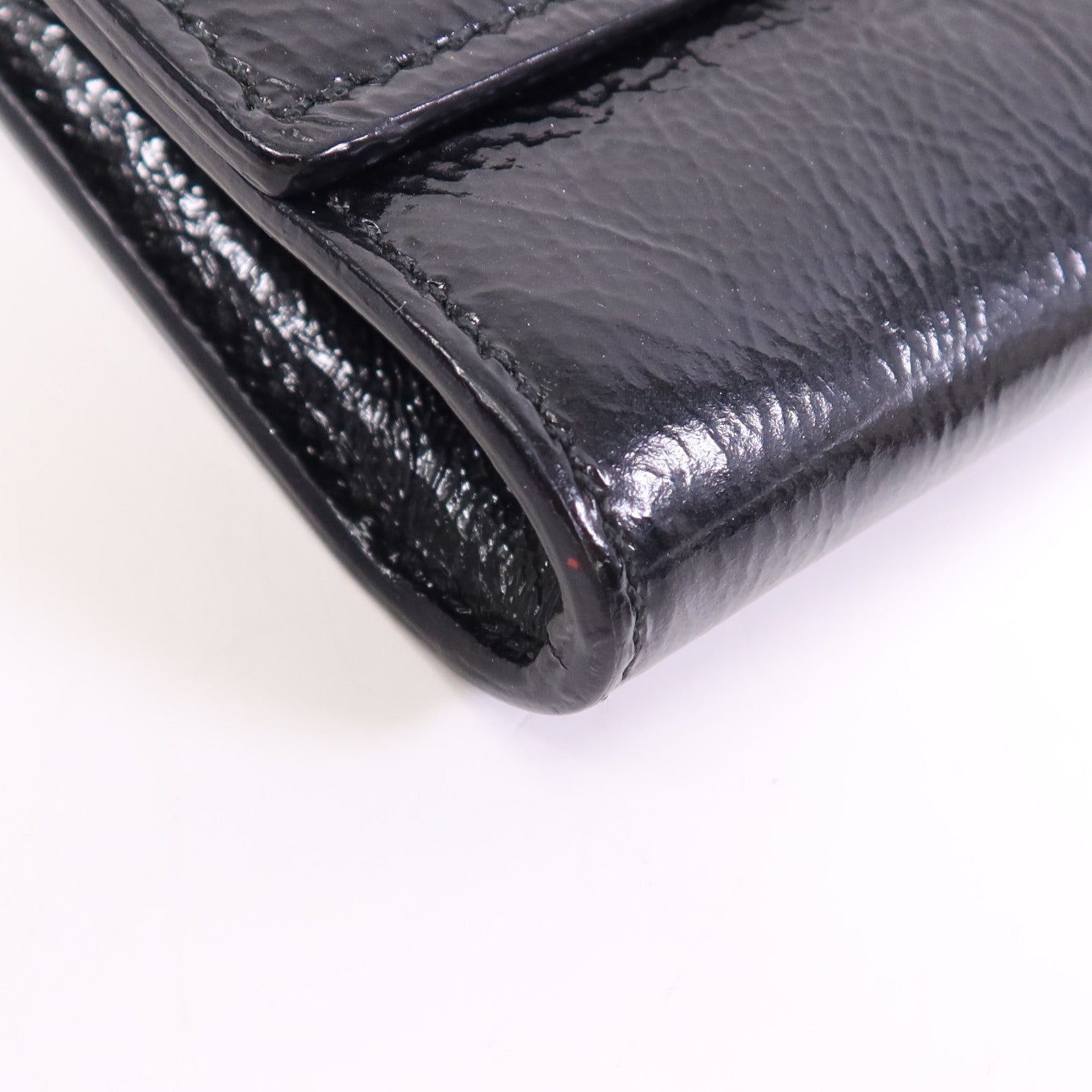 YVES SAINT LAURENT 牛皮皮革Clutch金扣手拿包