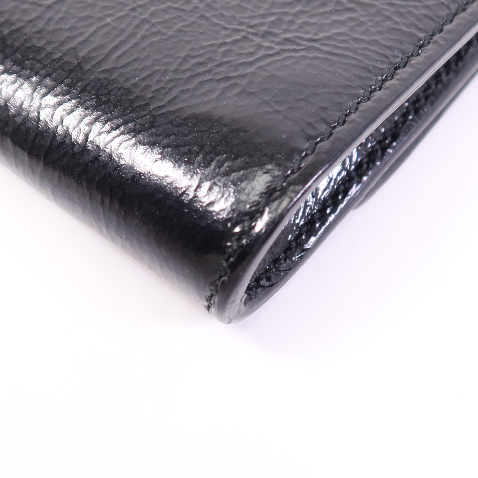 YVES SAINT LAURENT 牛皮皮革Clutch金扣手拿包
