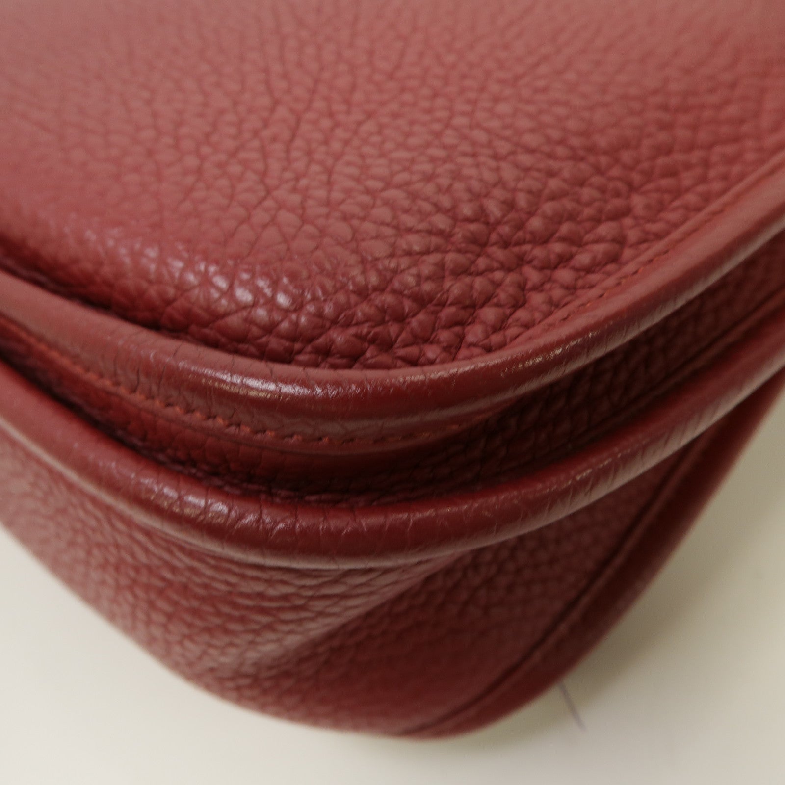 HERMES Clemence皮革Evelyne PM銀扣肩背袋紅寶石色