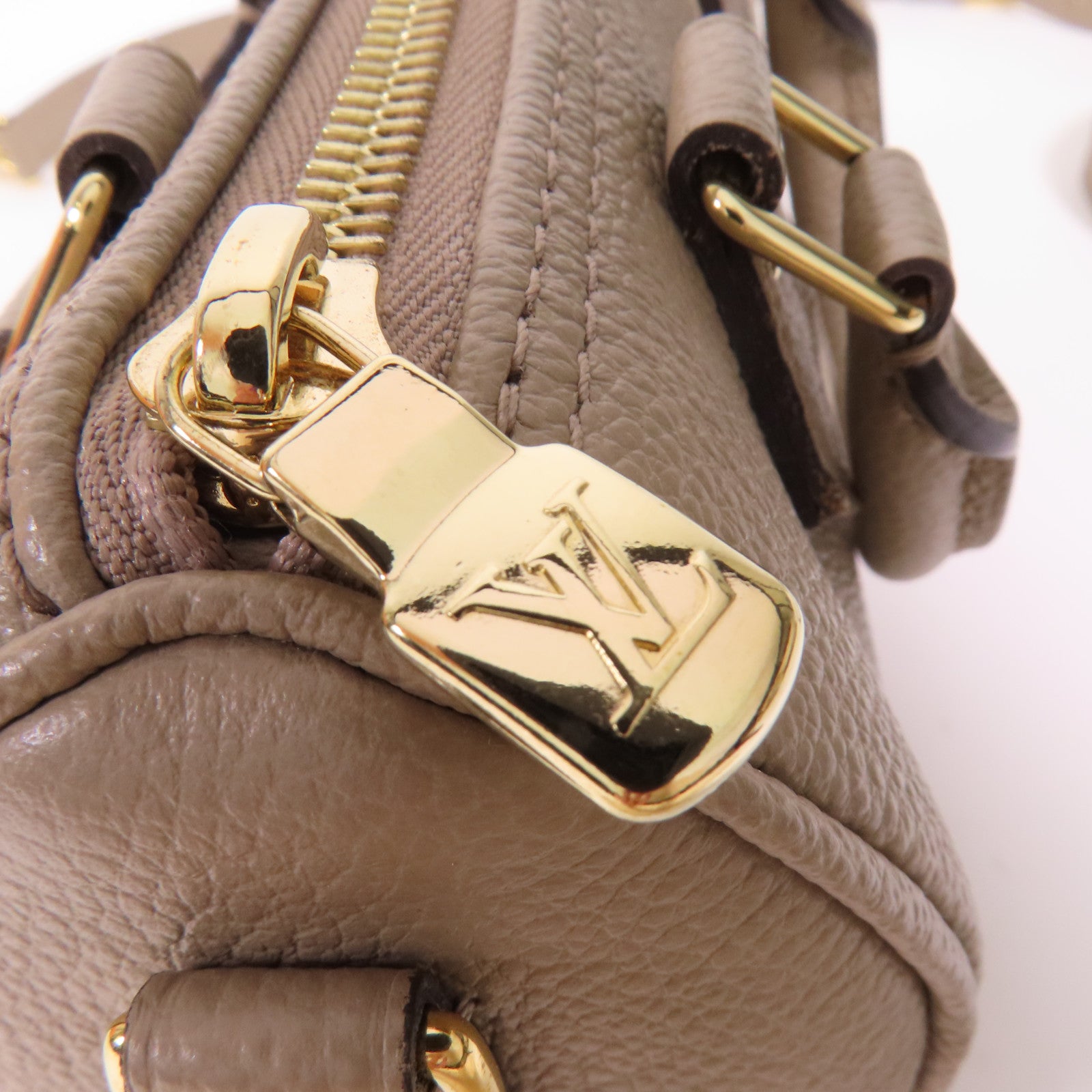 LOUIS VUITTON Monogram Empreinte Nano Speedy Bandouliere金扣手挽肩背兩用袋