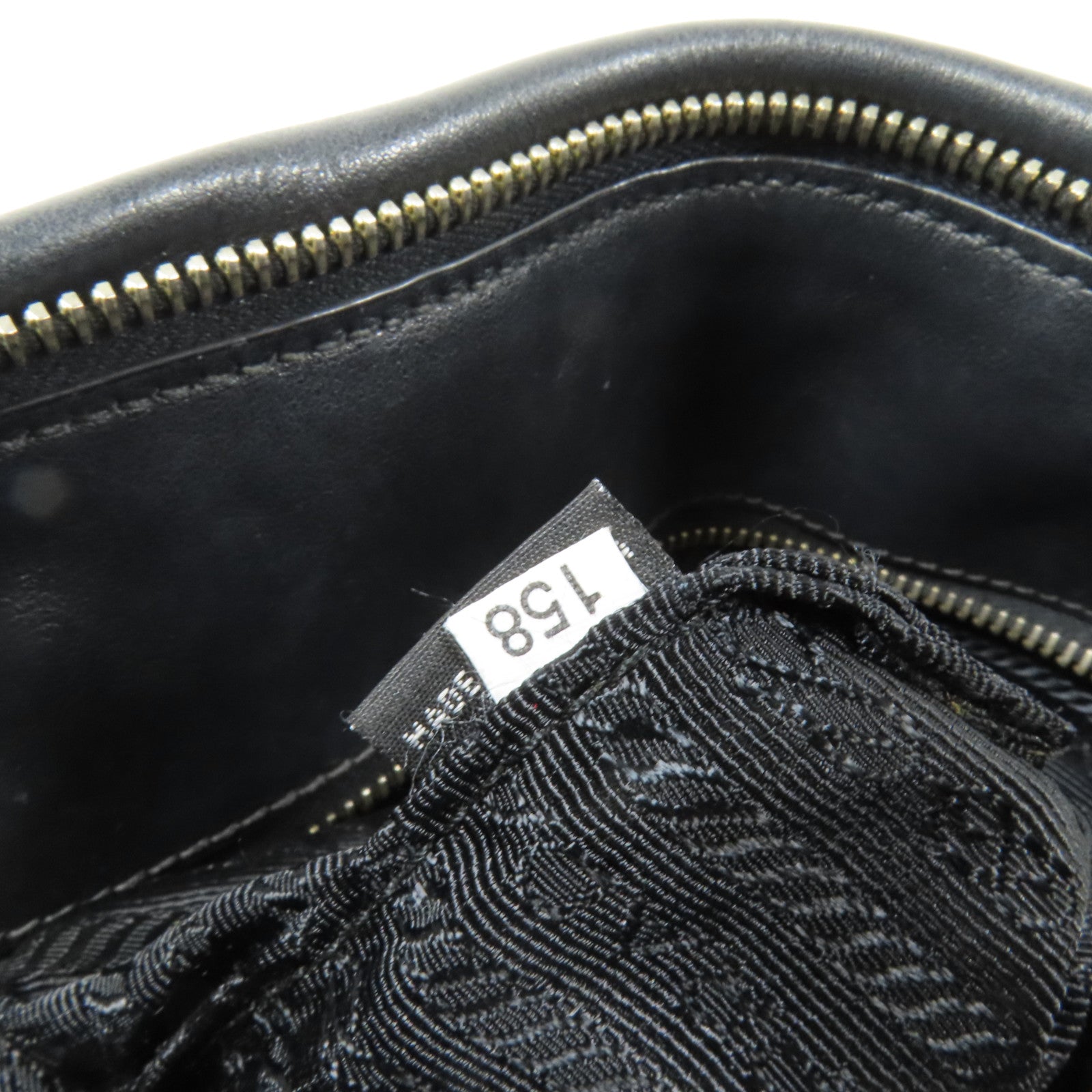 PRADA 牛皮皮革Bauletto金扣手挽袋