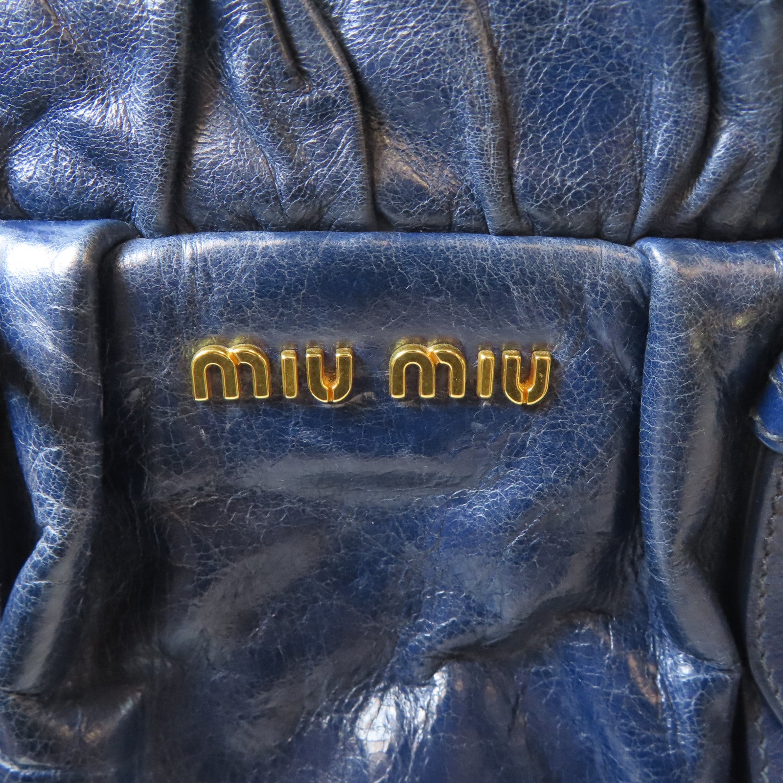 Miu Miu 牛皮皮革Shoulder Bag金扣肩背袋深藍色