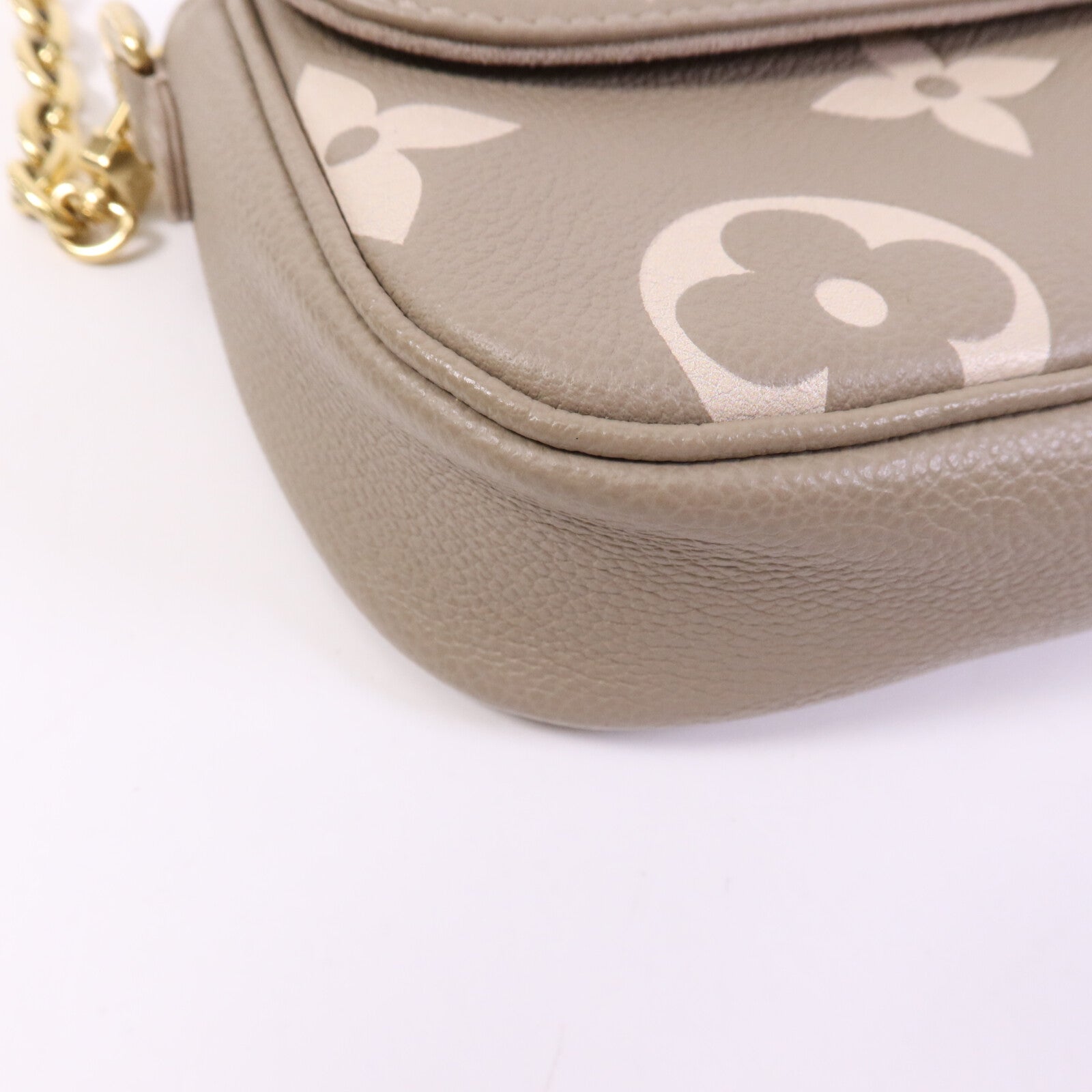 LOUIS VUITTON Monogram Empreinte WOC Ivy金扣鏈帶肩背袋