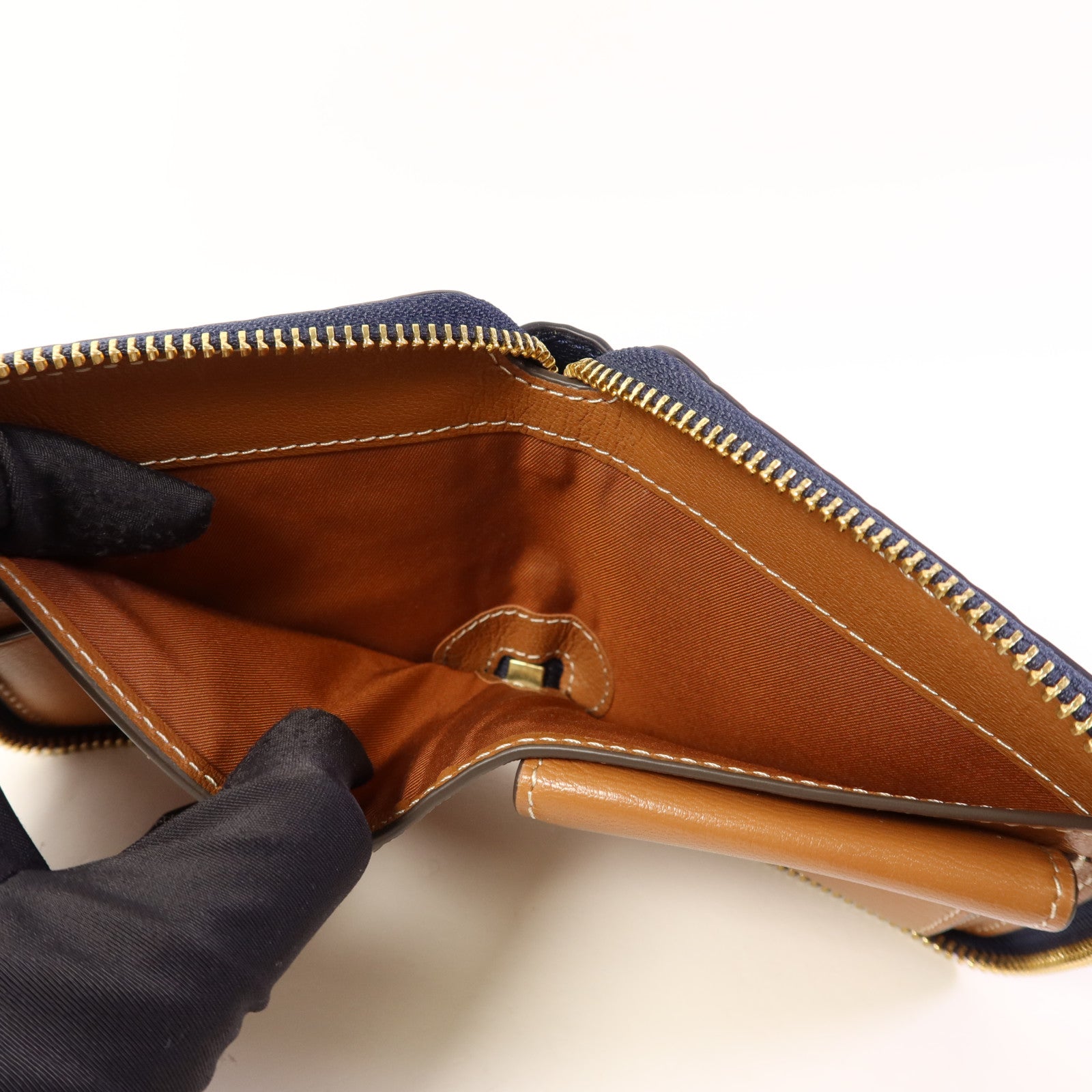 Tory Burch 牛皮皮革Round Wallet金扣錢包