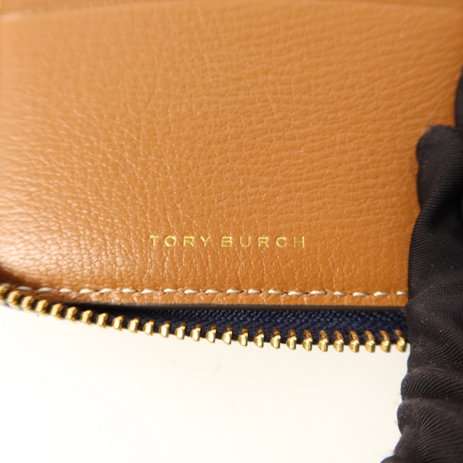 Tory Burch 牛皮皮革Round Wallet金扣錢包