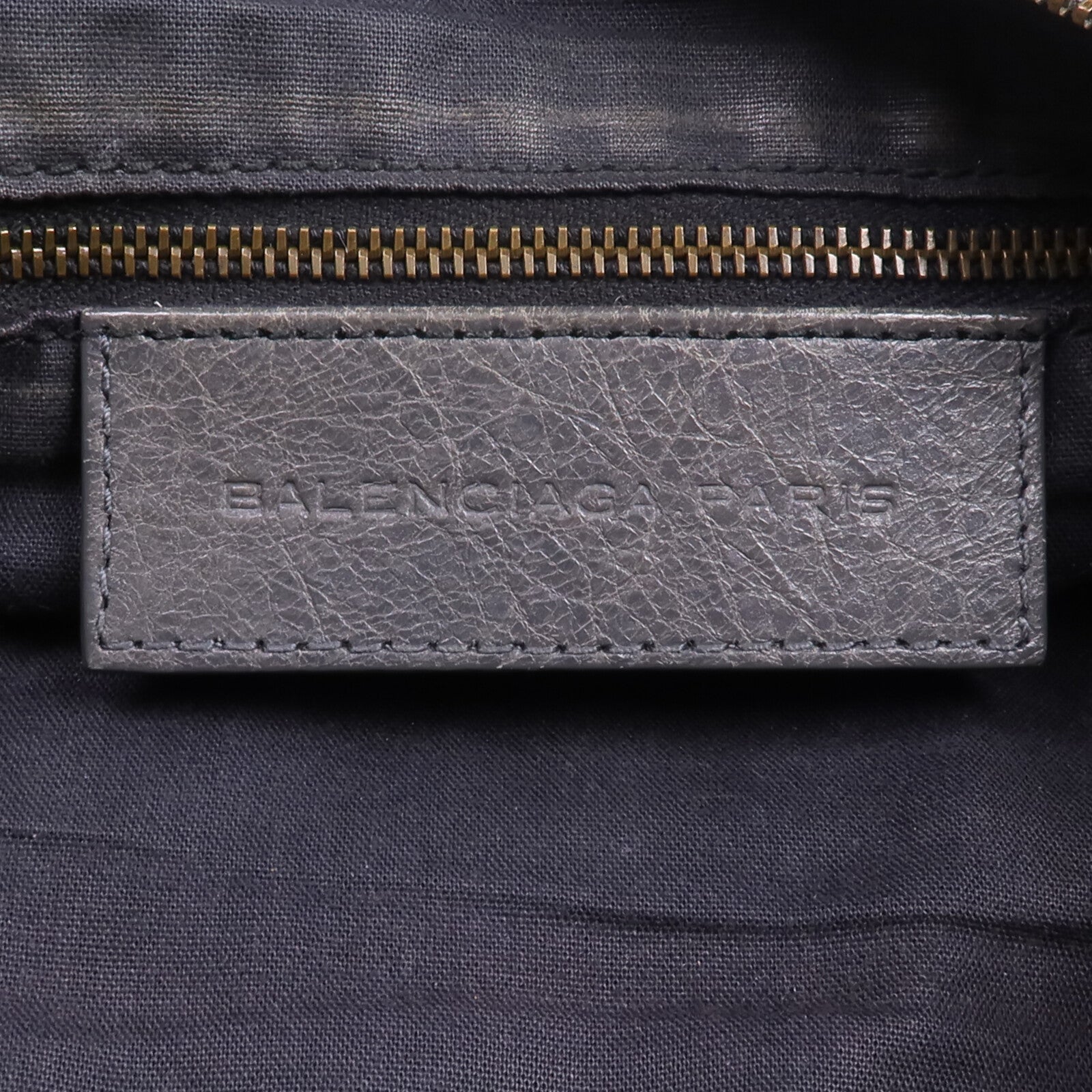 BALENCIAGA 牛皮皮革Motorcycle Clutch金扣手拿包