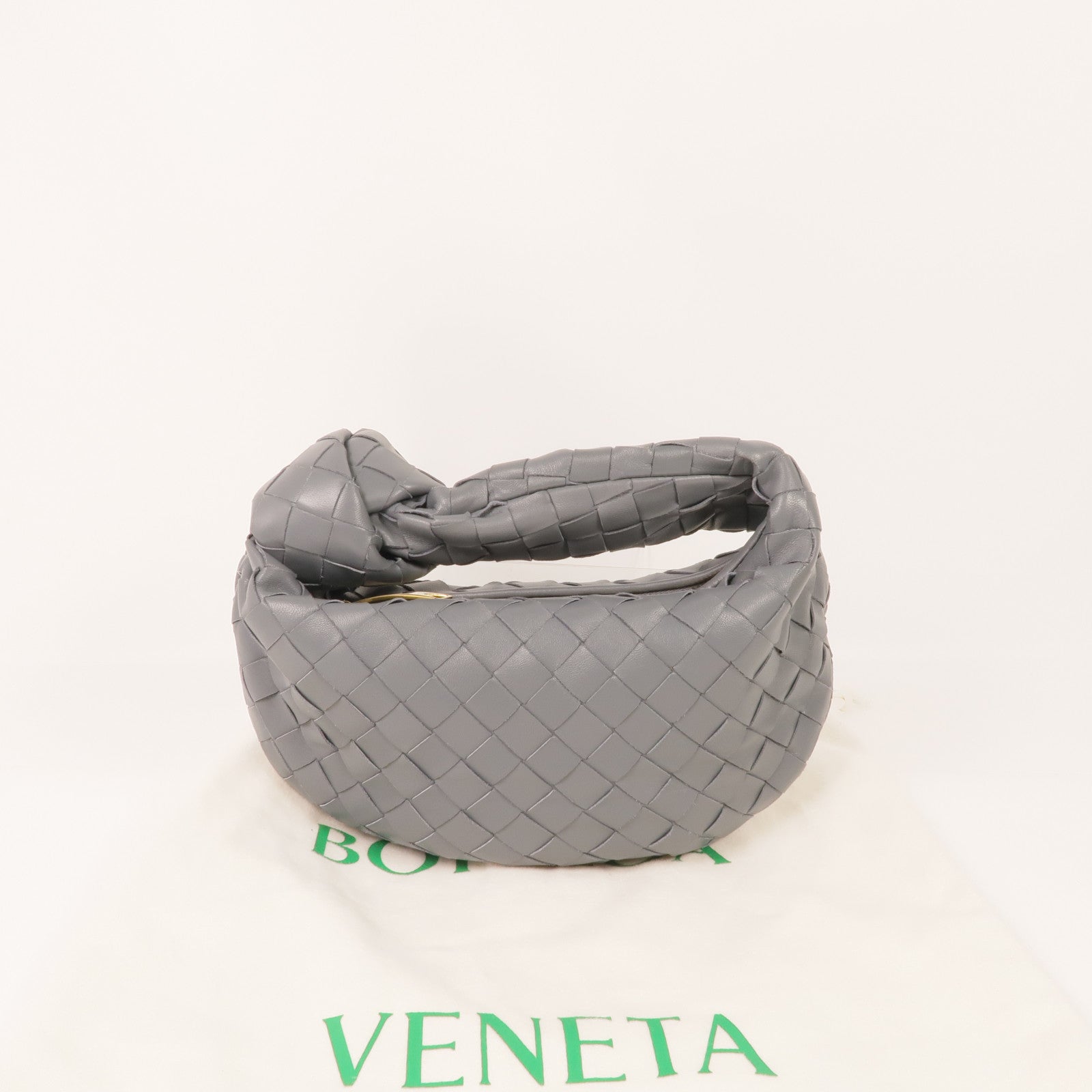 BOTTEGA VENETA 織紋皮革Mini Jodi金扣手挽袋