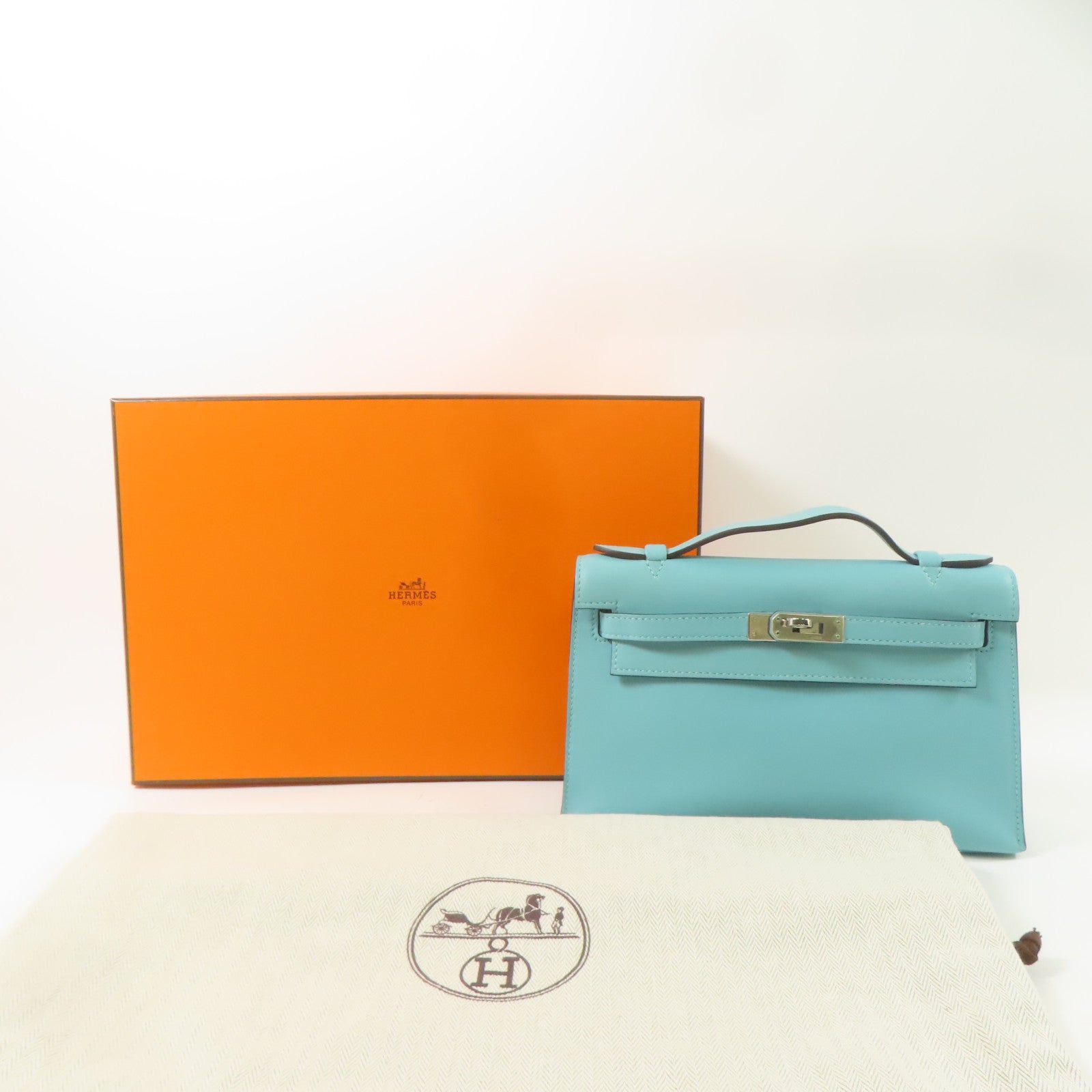 HERMES Swift皮革Kelly Pochette銀扣手挽袋Bleu Du Nord/藍色