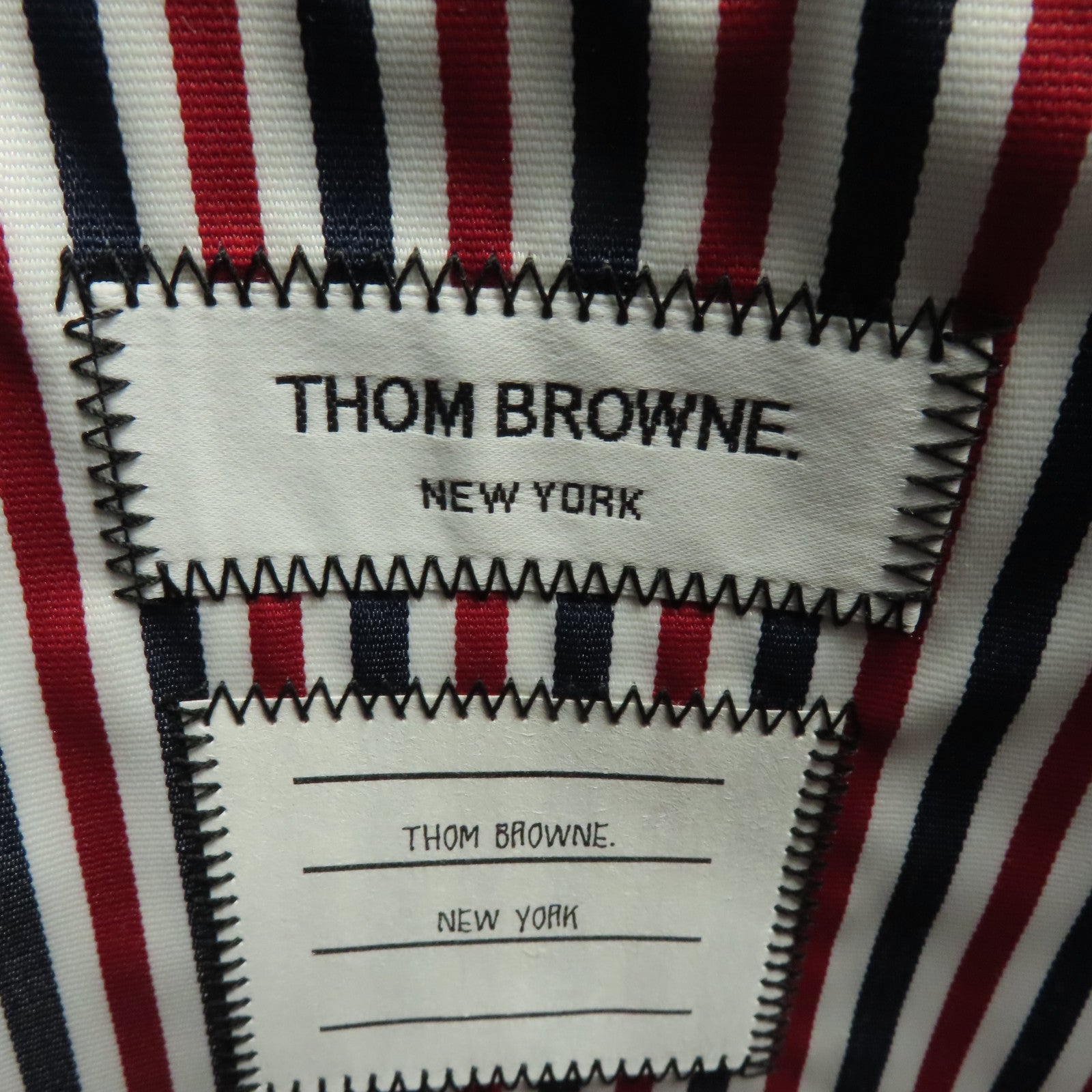 THOM BROWNE 牛皮皮革Thom Browne Clutch金扣手拿包黑色