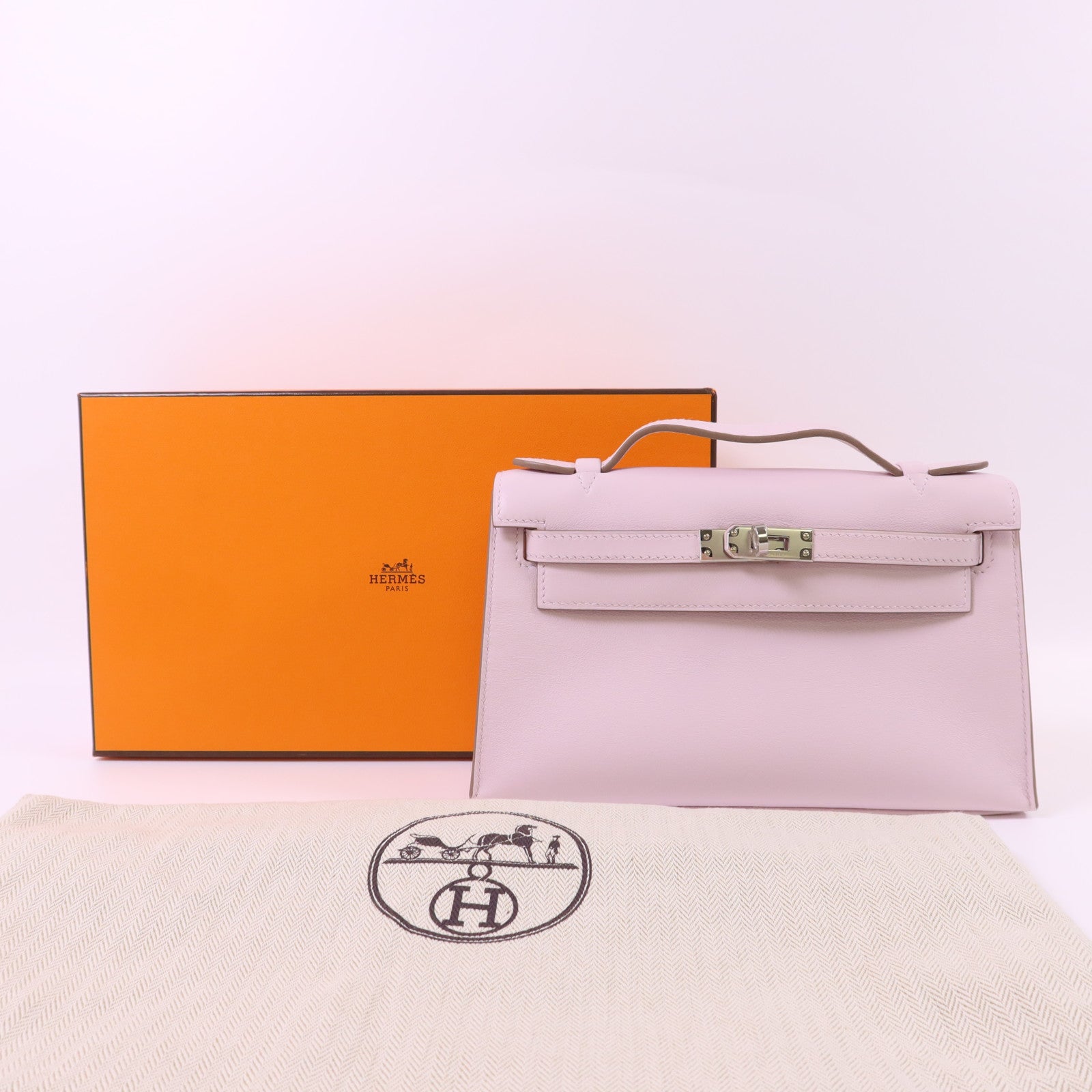 HERMES Swift皮革Kelly Pochette銀扣手挽袋Mauve Pale