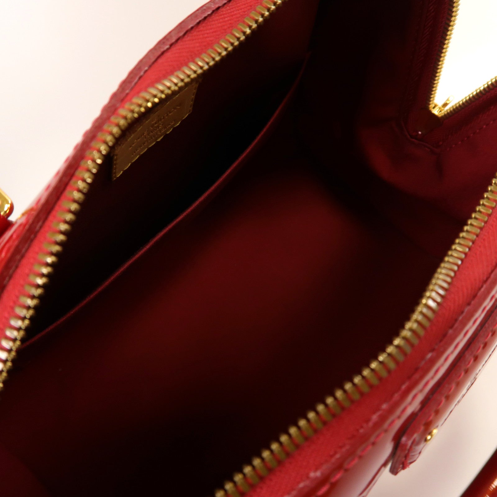 LOUIS VUITTON **【激減優惠】Monogram Vernis Montana金扣手挽袋紅色