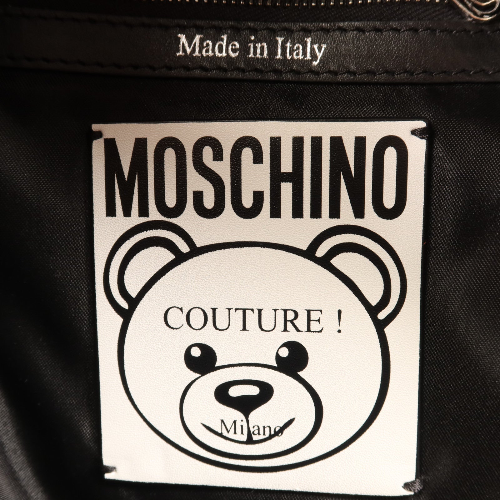 MOSCHINO 塗層帆布Backpack銀扣背包