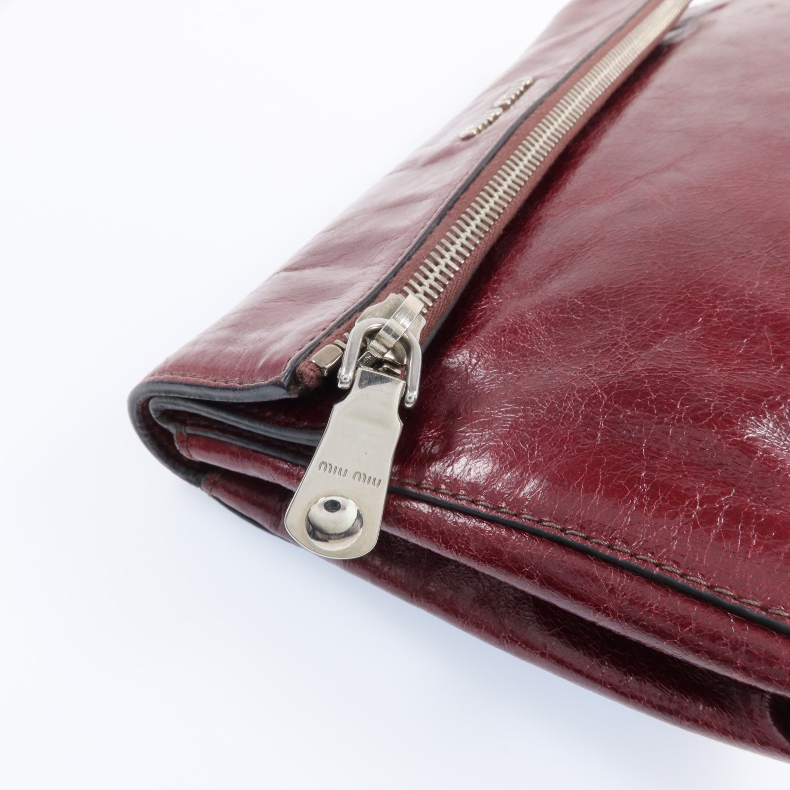 Miu Miu 牛皮皮革Clutch Bag銀扣手拿包