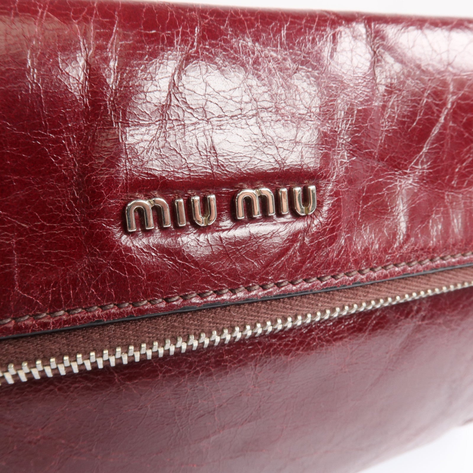 Miu Miu 牛皮皮革Clutch Bag銀扣手拿包