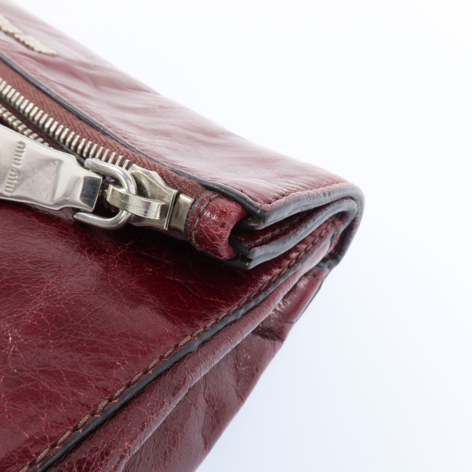 Miu Miu 牛皮皮革Clutch Bag銀扣手拿包